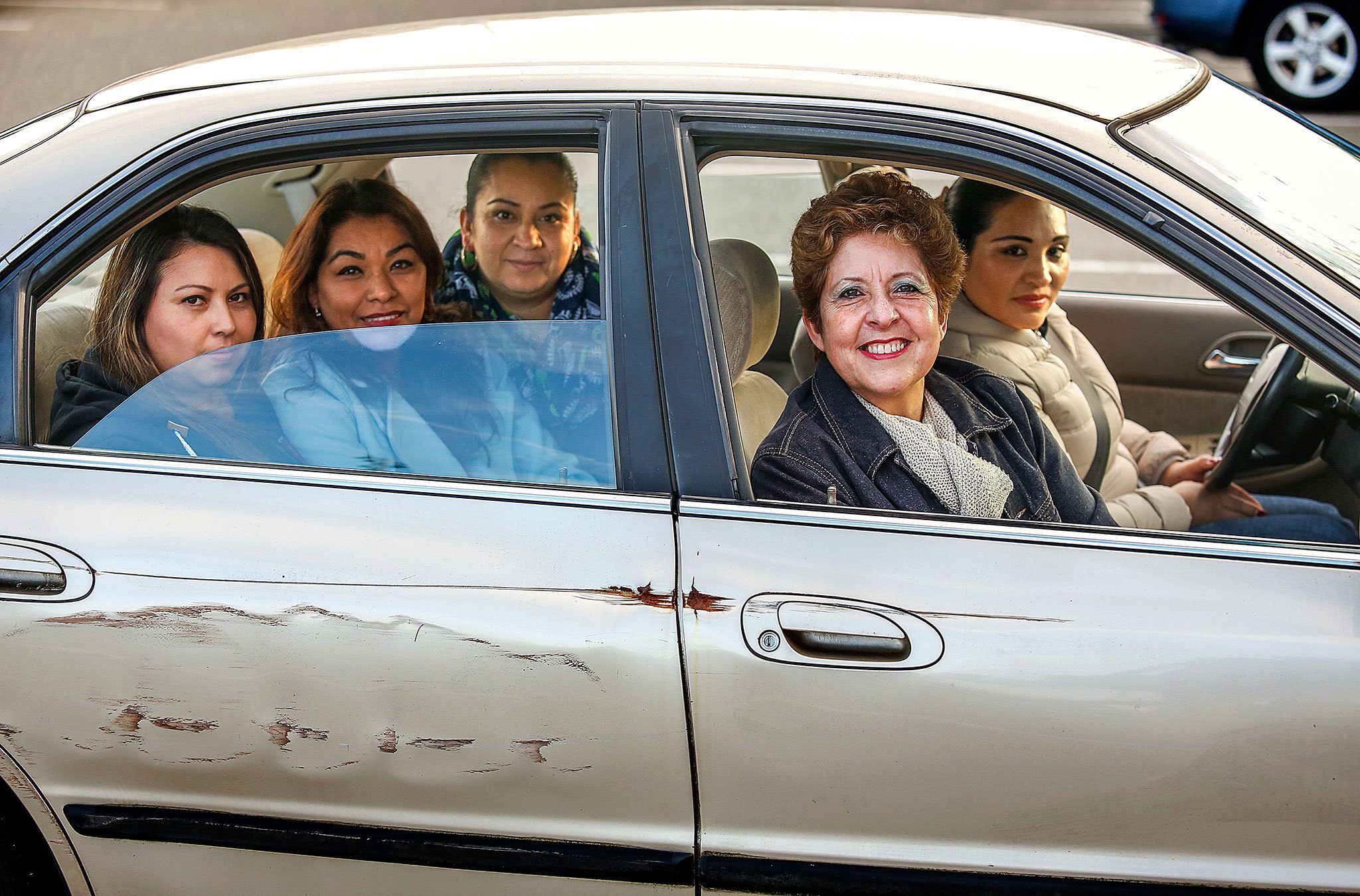 Miriam Vargas (right front) volunteers as a promotora and teaches a Spanish GED class with her husband. She noticed that transportation is a barrier for women who are trying to be independent, so she taught about 30 women to drive using her own 1994 Honda Accord. (Dan Bates / The Herald)