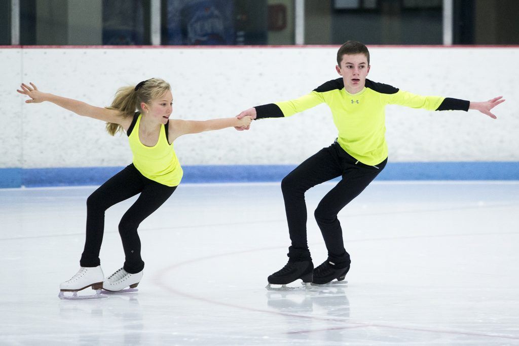 Kayla, 10, and her brother, Kamden Black, 13, of Snohomish, skate during a training session at Olympic View Arena in Mountlake Terrace on Dec. 15. The pair will compete at the U.S. Figure Skating Championships held in Kansas City, Missouri, in January. (Ian Terry / The Herald)
