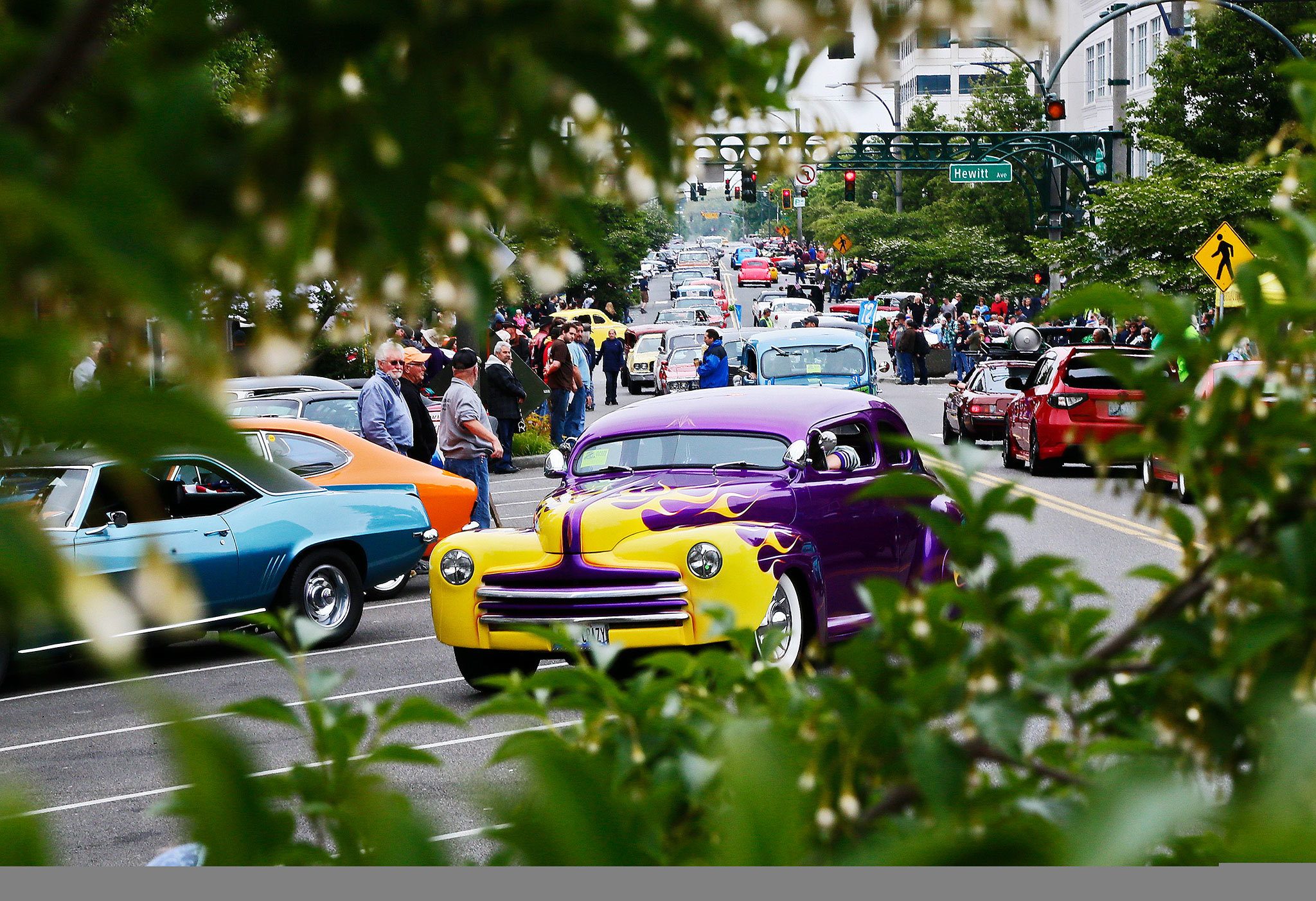 Scenes of Cruzin to Colby in Everett in 2015. The Seattle Rod-Tiques, who organize the annual event, have decided not to put on a show in 2017. (Kevin Clark / The Herald)