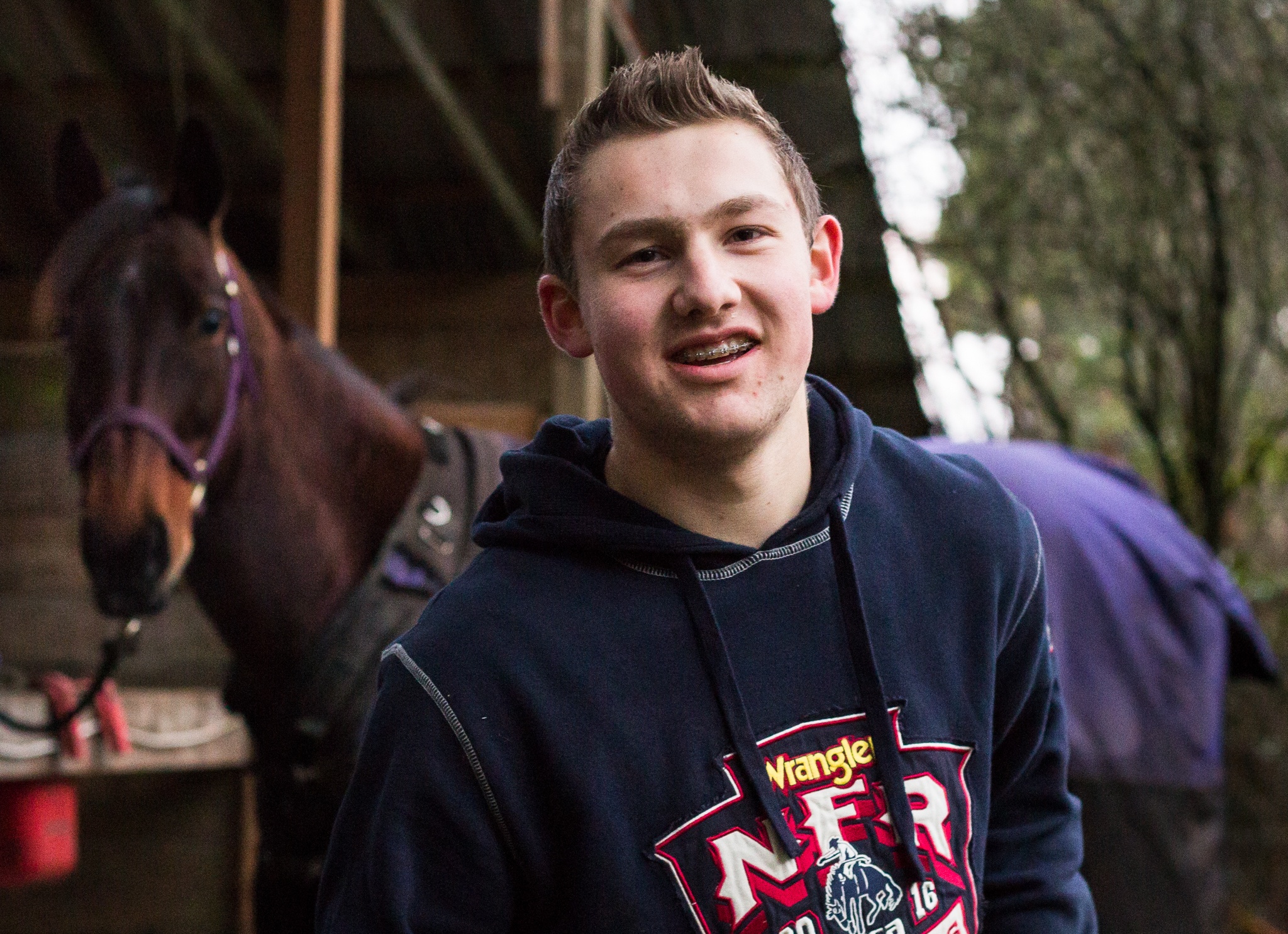 Micah Sebranke, 17, pictured with his horse, Koda, is a senior at Cedar Park Christian School in Bothell and an avid equestrian involved in 4-H events where he is known for bringing an extra horse for the younger kids to ride. (Daniella Beccaria / The Herald)