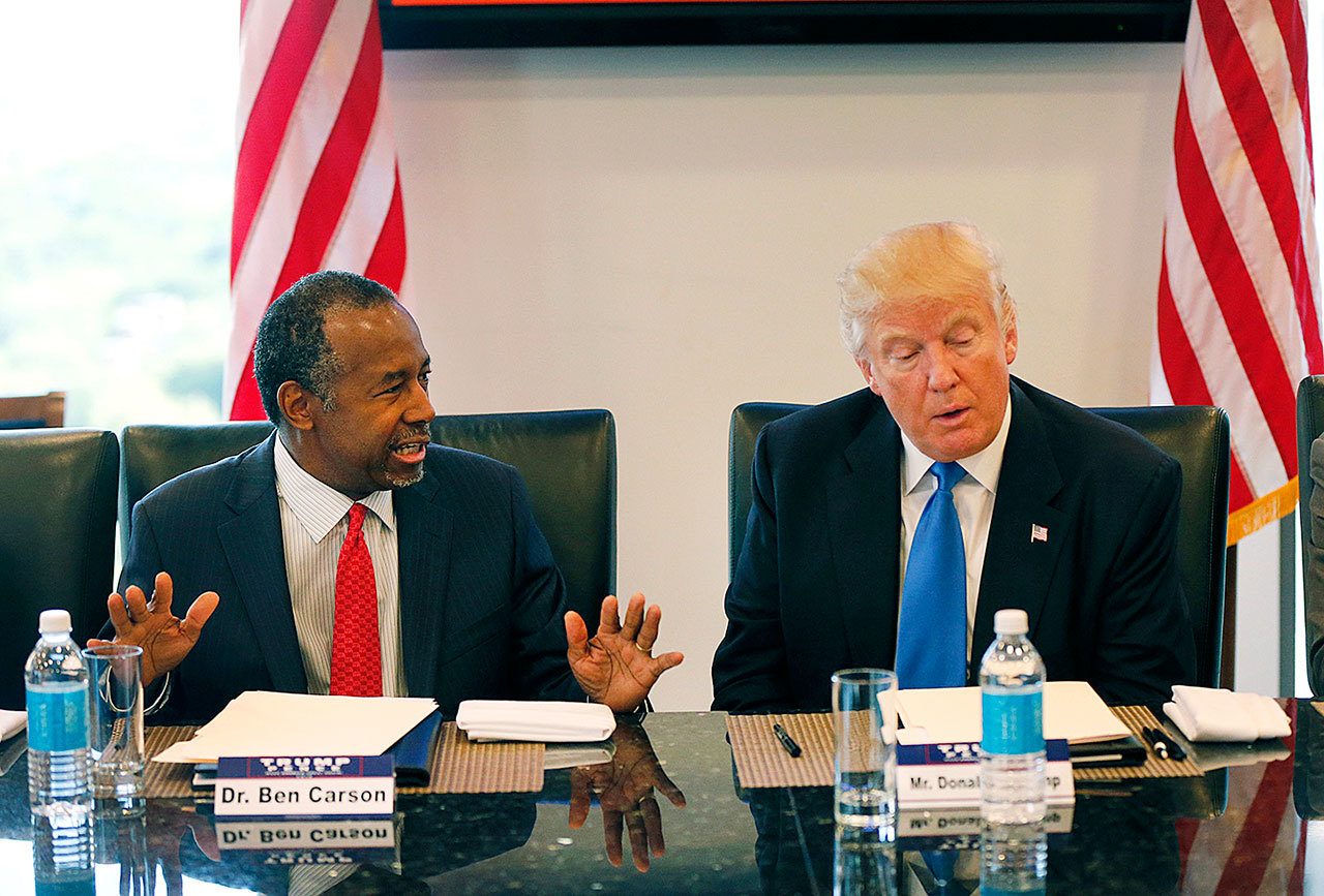 In this Aug. 25 photo, former Republican presidential candidate Dr. Ben Carson speaks during Donald Trump’s roundtable meeting with the Republican Leadership Initiative in his offices at Trump Tower in New York. Trump has chosen Carson to become secretary of the Department of Housing and Urban Development. (AP Photo/Gerald Herbert, file)