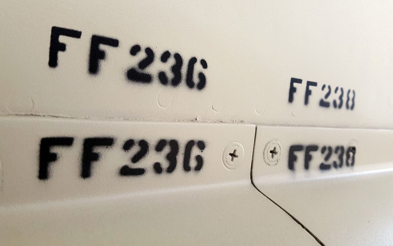 FF stands for “Forward Fuselage.” These are an example of the hundreds of panel-access codes that appear all over the skin of the F-105G Thunderchief. (Flying Heritage College)