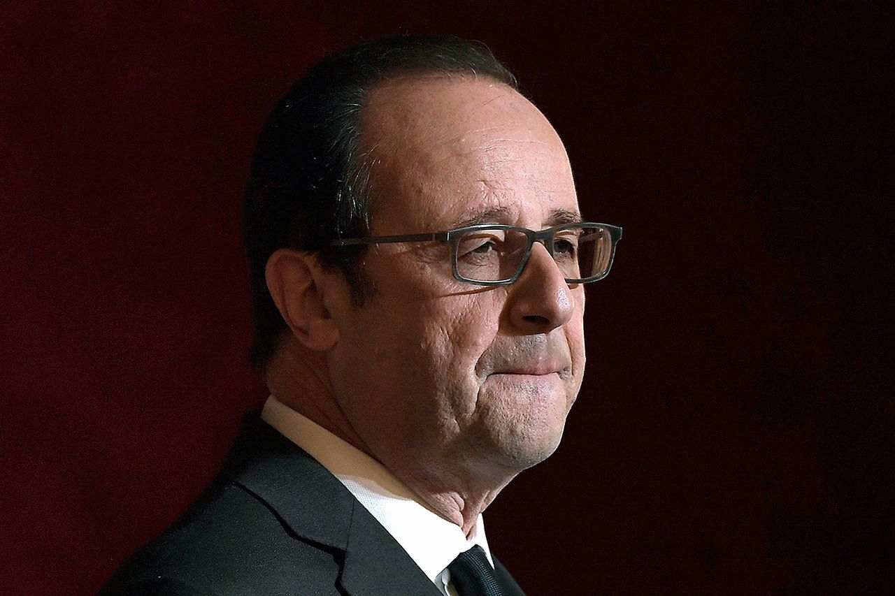 French President Francois Hollande delivers a speech after awarding the Legion of Honour (Legion d’Honneur) and the National Order of Merit (Ordre National du Merite) to Olympic and Paralympic athletes at the Elysee Presidential Palace in Paris, France, on Thursday, Dec. 1. French President Hollande says he’s not running in 2017 because he knows he might not have enough support. (Lionel Bonaventure/Pool Photo via AP)