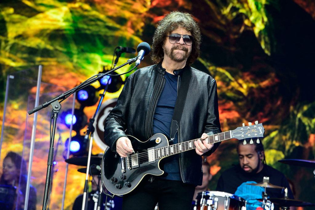 In this June 2016 photo, Jeff Lynne from British band Electric Light Orchestra performs at the Glastonbury music festival at Worthy Farm, in Somerset, England. (Photo by Jonathan Short/Invision/AP, File)
