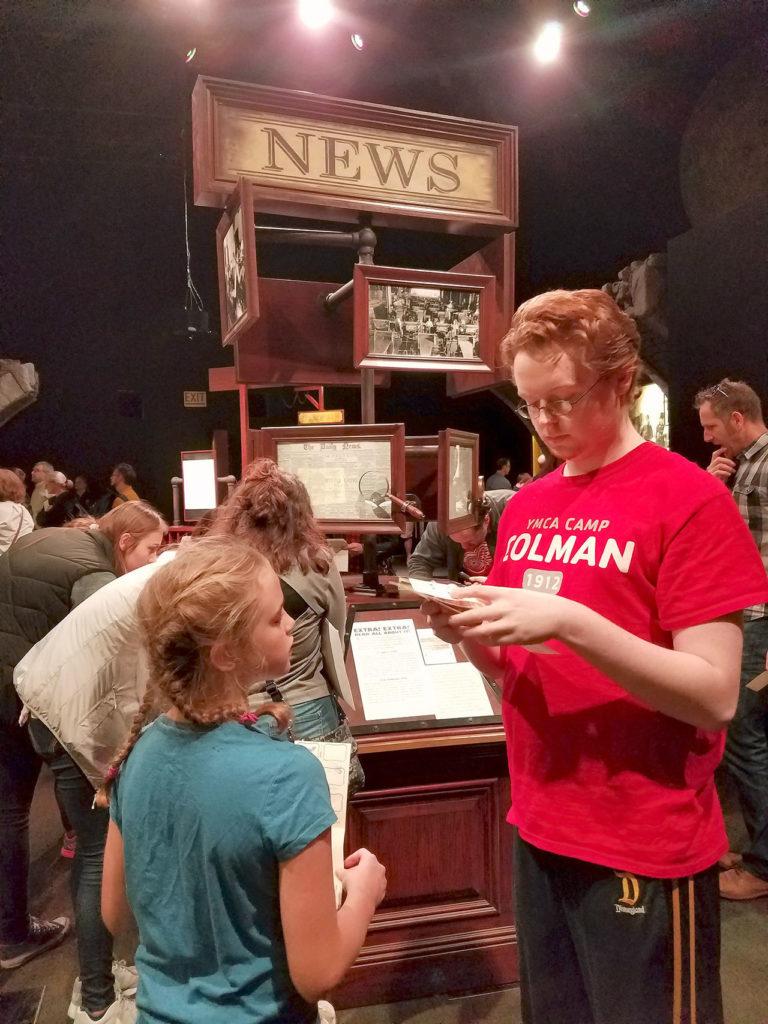 Ella Okeson, 9, and Liam Church-Okeson, 16, put their heads together in the Underground Station. (Christina Okeson / The Herald)
