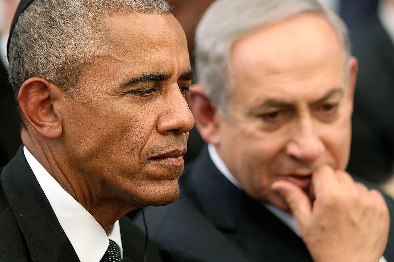 In this Sept. 30 photo, President Barack Obama and Israeli Prime Minister Benjamin Netanyahu talk during the funeral of former Israeli President and Prime minister Shimon Peres in Jerusalem. (Menahem Kahana, Pool via AP, File)