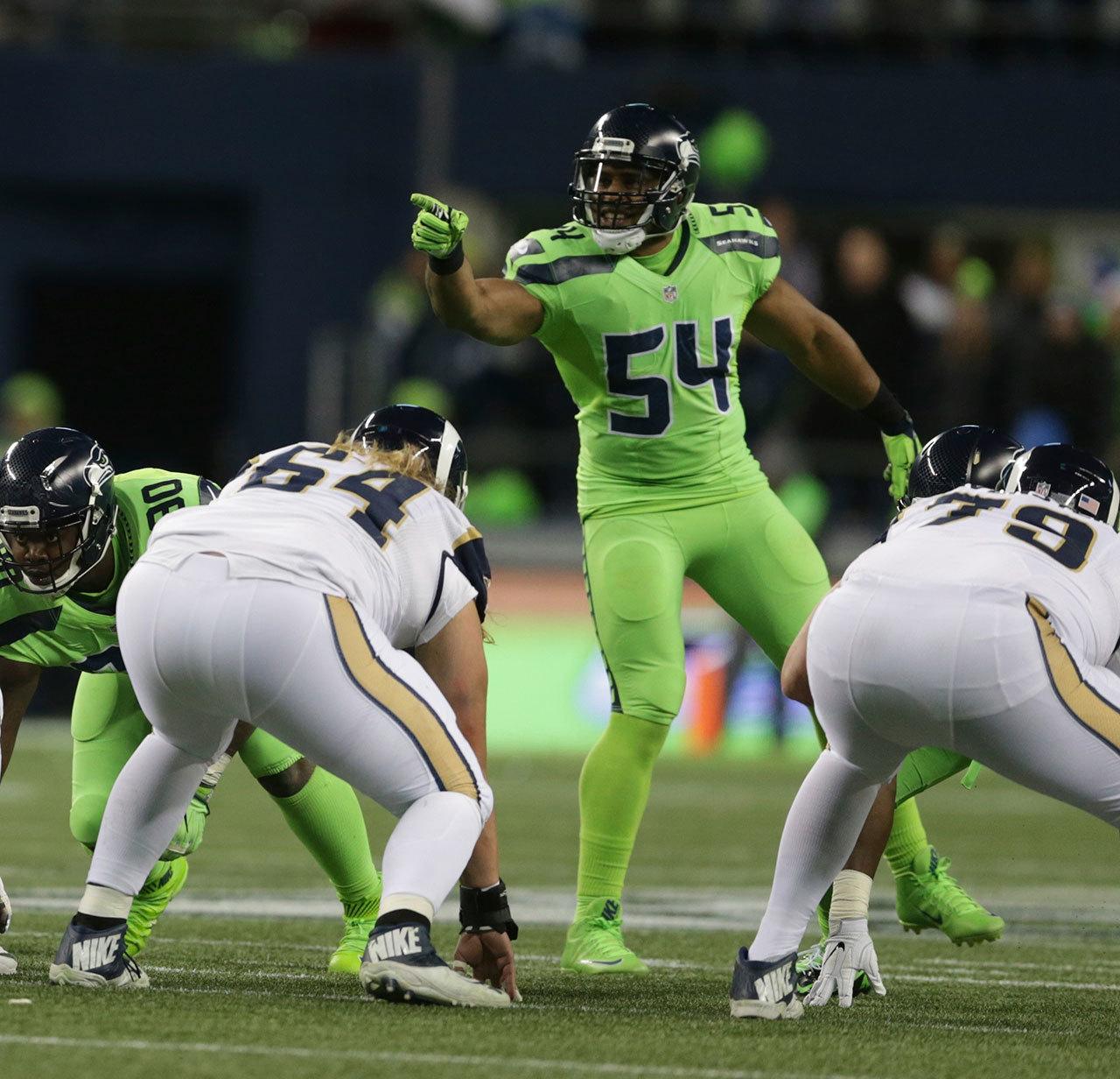 Seahawks middle linebacker Bobby Wagner (54) gestures towards the Rams offense during the second half of a game Dec. 15 in Seattle. (AP Photo/Scott Eklund)