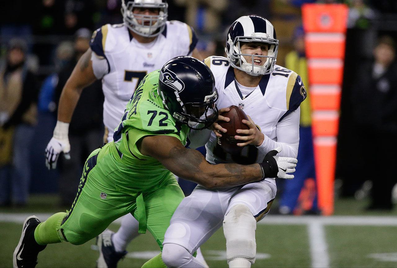 Seahawks defensive end Michael Bennett (72) sacks Rams quarterback Jared Goff in the second half of a game on Dec. 15. (AP Photo/Elaine Thompson)