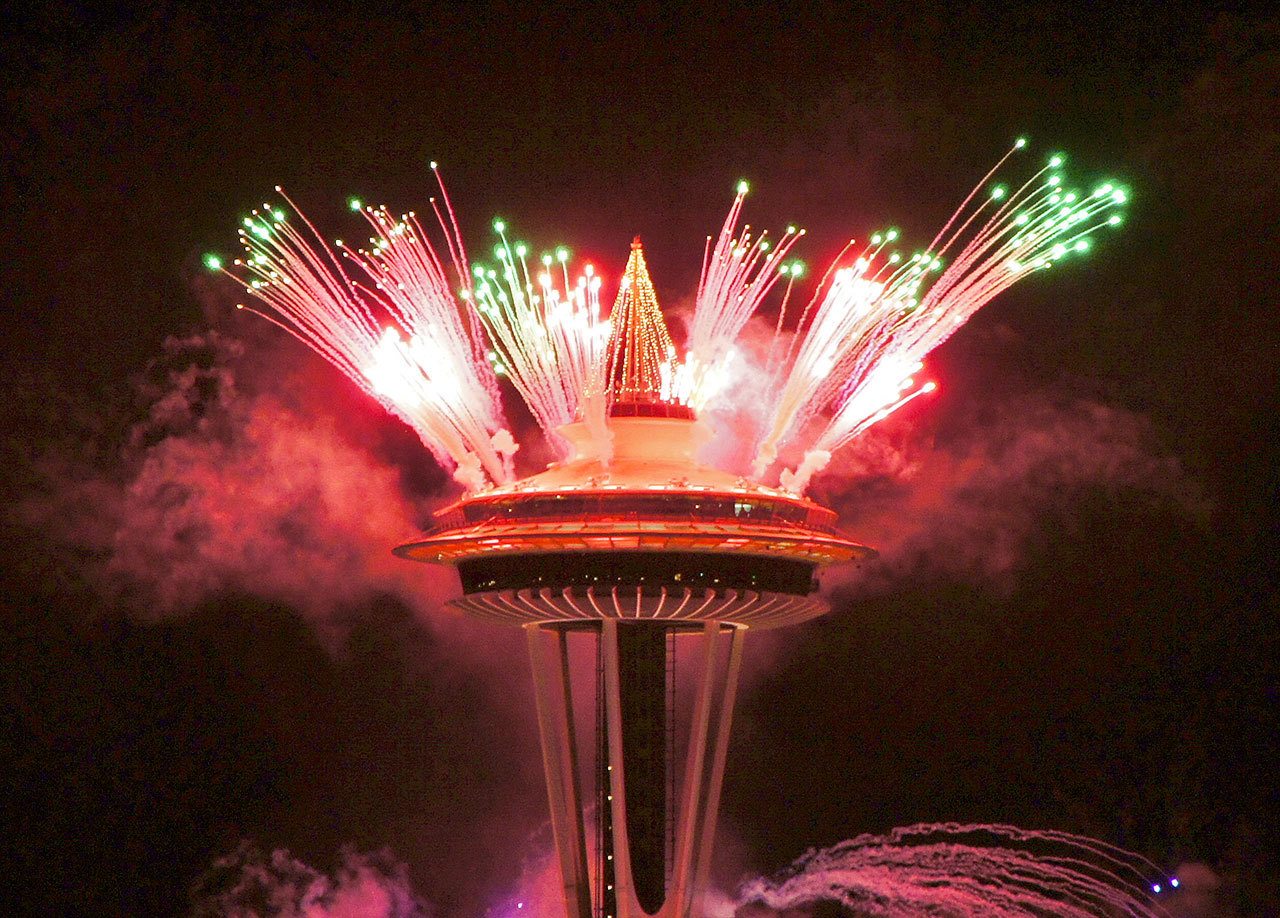 Fireworks shoot off around the disc of the Space Needle in Seattle during the New Year’s Eve celebration in 2011. (Sea Turtle photo / Flickr)