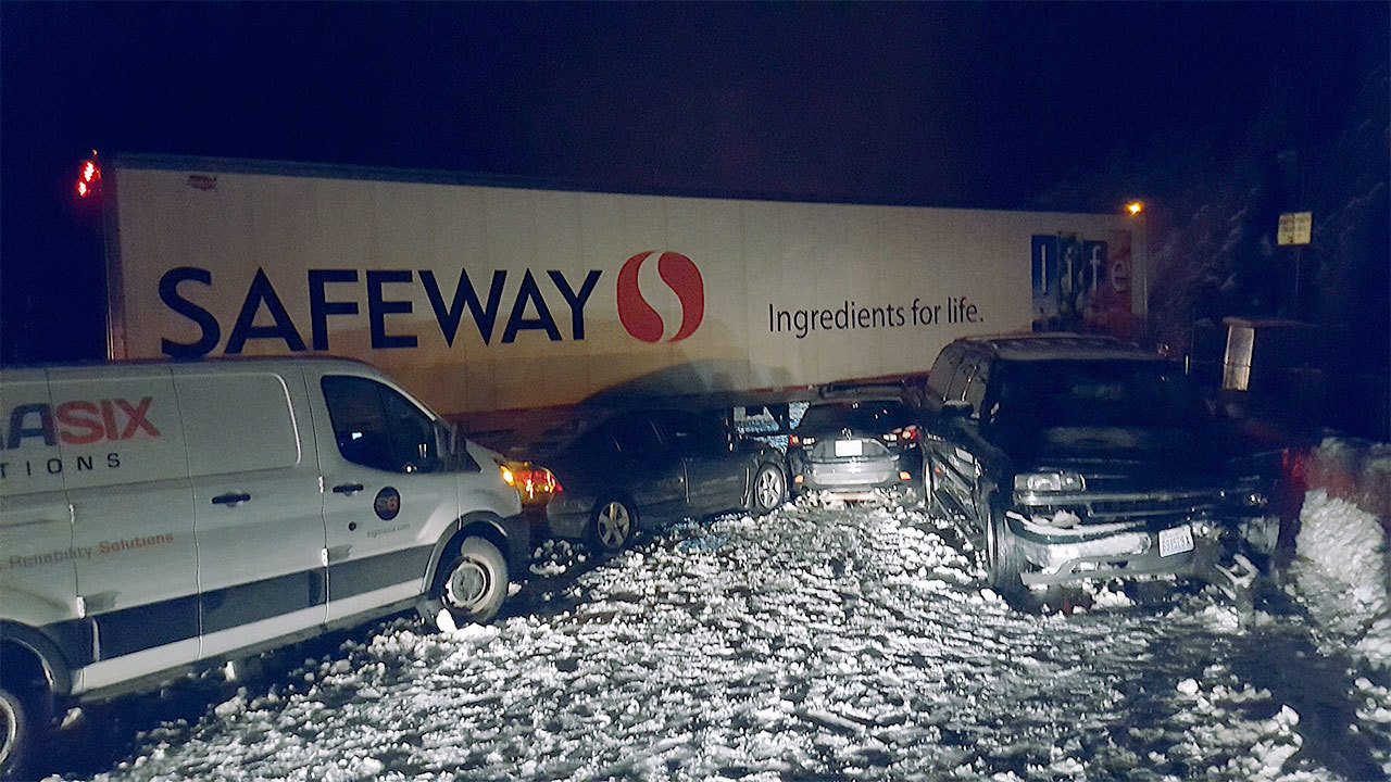 A sudden storm Nov. 30 dropped four inches of snow on the I-90 Snoqualmie Pass, ultimately requiring all vehicles except all-wheel drive to chain-up. Some drivers did not, and several collisions followed, including this pile-up. Road closures lasted up to 7 hours. Weather conditions in the passes can change quickly and drivers should be prepared by carrying chains and knowing how to put them on. (WSDOT photo)