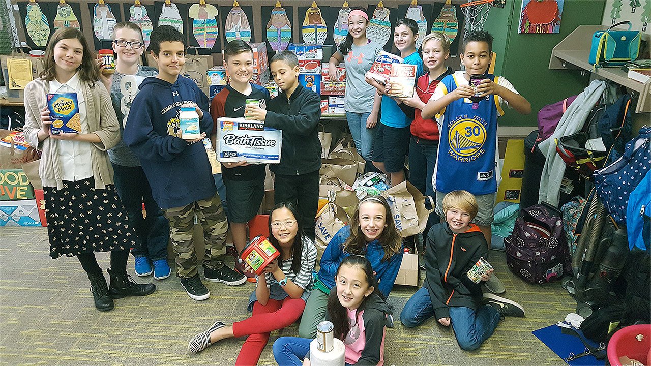 Sixth-grade students in teacher Morgan Brockmann’s class at Cedar Park Christian School Lynnwood collected 1,600 pounds of food for the Lynnwood Food Bank. (Contributed photo)
