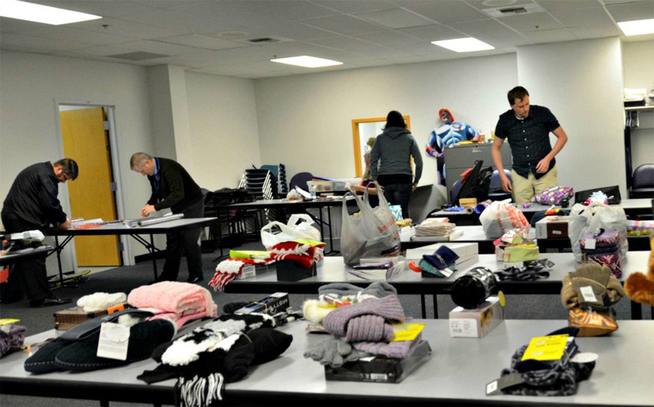 Community Transit employees assembled gifts for 70 homeless Everett-area teens. The transit agency partnered with Washington Kids in Transition and Volunteers of America for the effort. (Contributed photo)