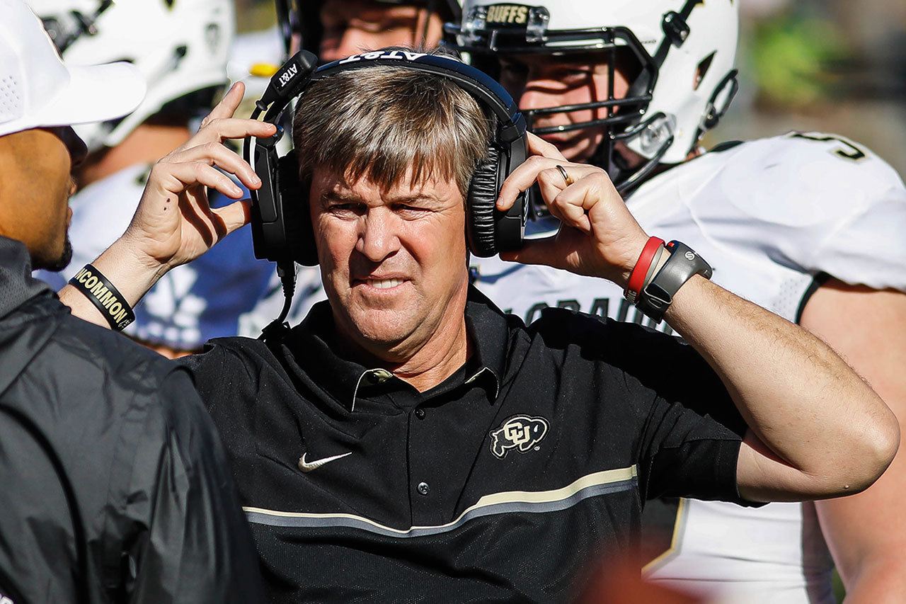 Colorado head coach Mike MacIntyre works the sidelines during a game against Oregon in September. MacIntyre is The Associated Press college football Coach of the Year after leading the Buffaloes to a 10-3 record and their first bowl game since 2007. (AP Photo/Thomas Boyd, File)