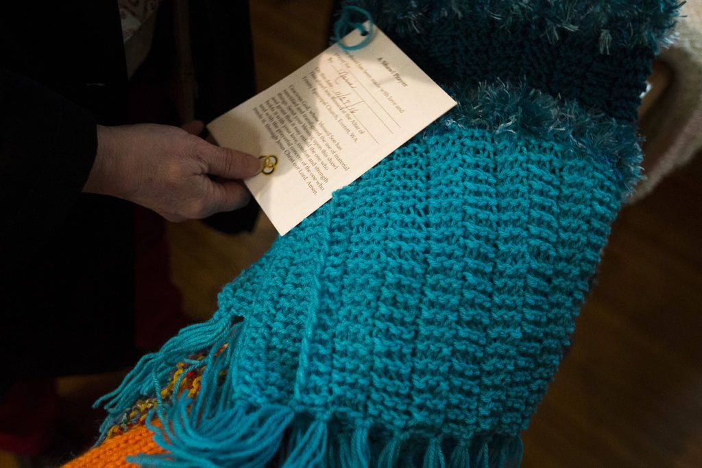 
The church’s knit and crochet group members have knitted and crocheted hundreds of prayer shawls that they distribute to hospice patients and others throughout the year.
(Ian Terry / The Herald)

