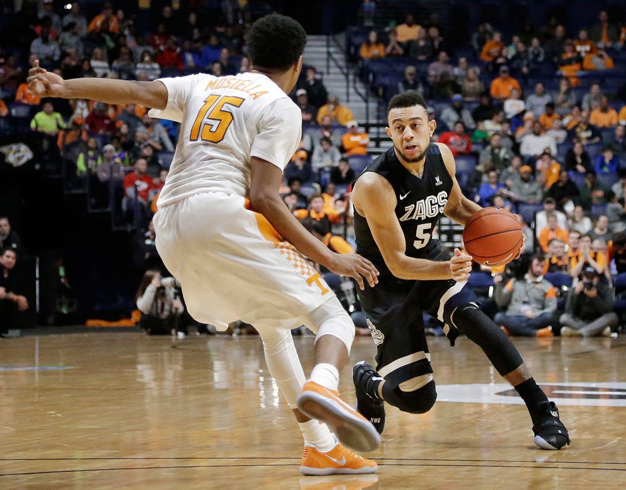 Gonzaga guard Nigel Williams-Goss (5) drives against Tennessee guard Detrick Mostella (15) in the second half of Sunday’s game. Williams-Goss led the Bulldogs with 20 points. (AP Photo/Mark Humphrey)
