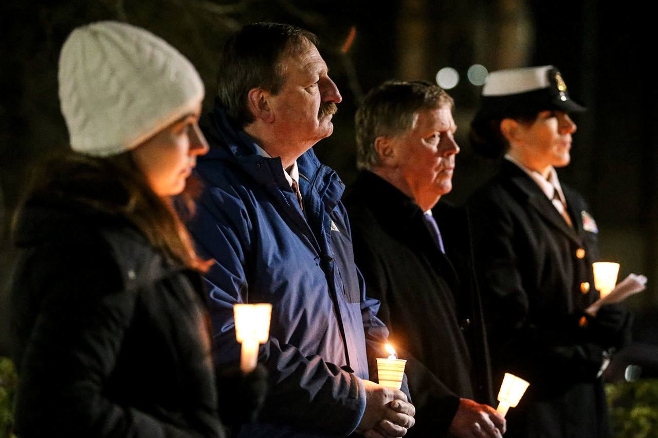 Megan Herrenkohl (from left), Snohomish County Executive Dave Somers, Everett Mayor Ray Stephanson and Alicia Armer listen to speakers. (Kevin Clark / The Herald)