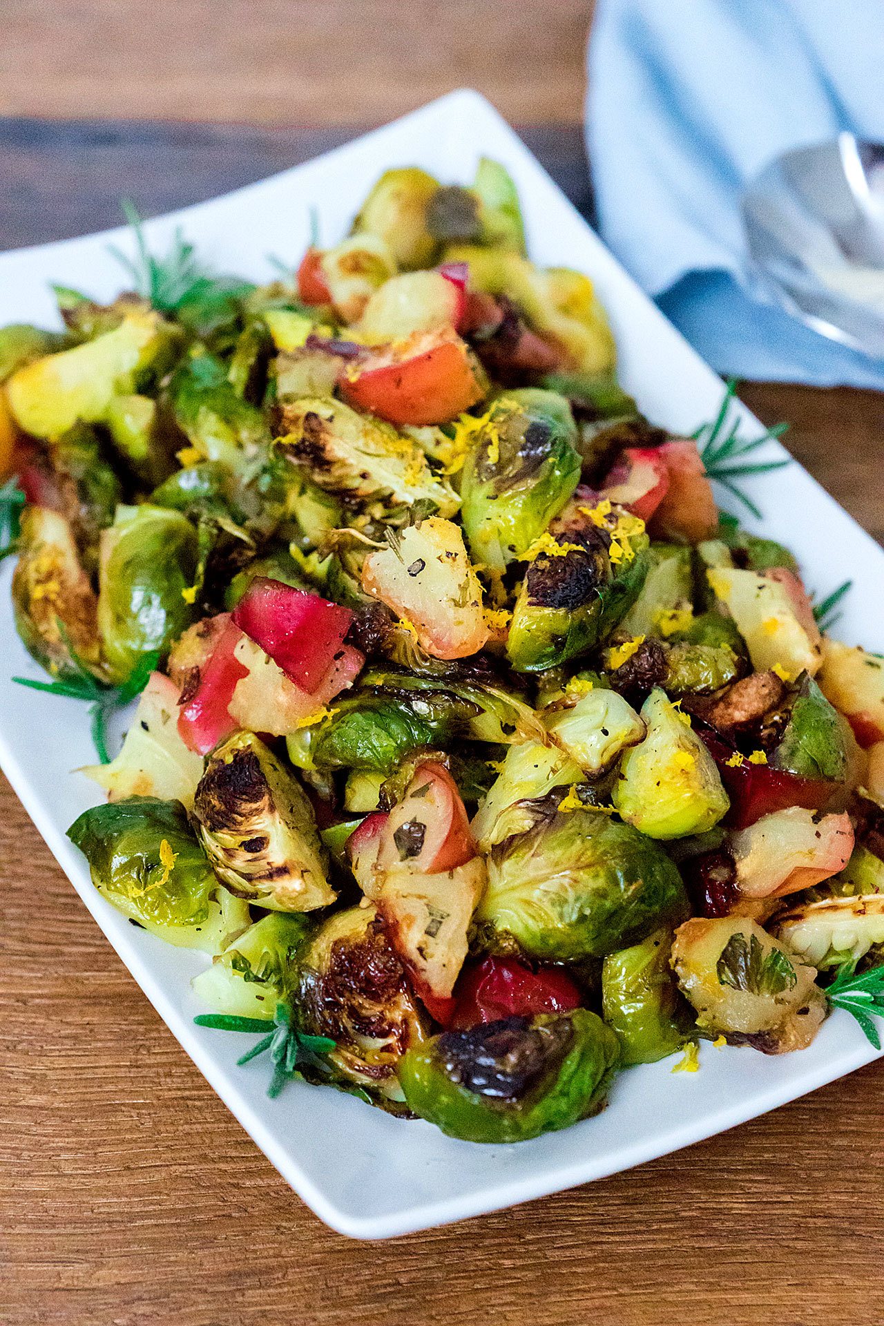 Rosemary roasted brussels sprouts are seasoned with a mixture of apple, citrus and rosemary. (Rose McAvoy)
