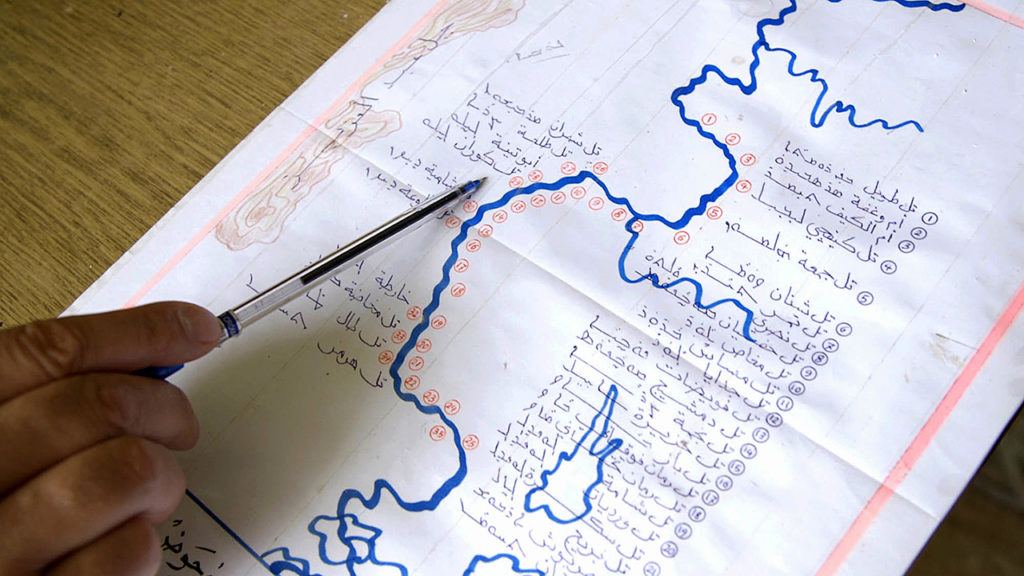 A map shows the string of Assyrian Christian villages attacked by the Islamic State group along northern Syria’s Khabur River in this frame grab from “Silence After the Storm,” a documentary about the villages by Assyrian filmmaker Sargon Saadi. The villages now stand virtually deserted after the militants attacked in February 2015, taking more than 200 men, women and children captive and driving out the rest, all members of a community that traces its heritage back to the beginnings of Christianity. (Sargon Saadi via AP)
