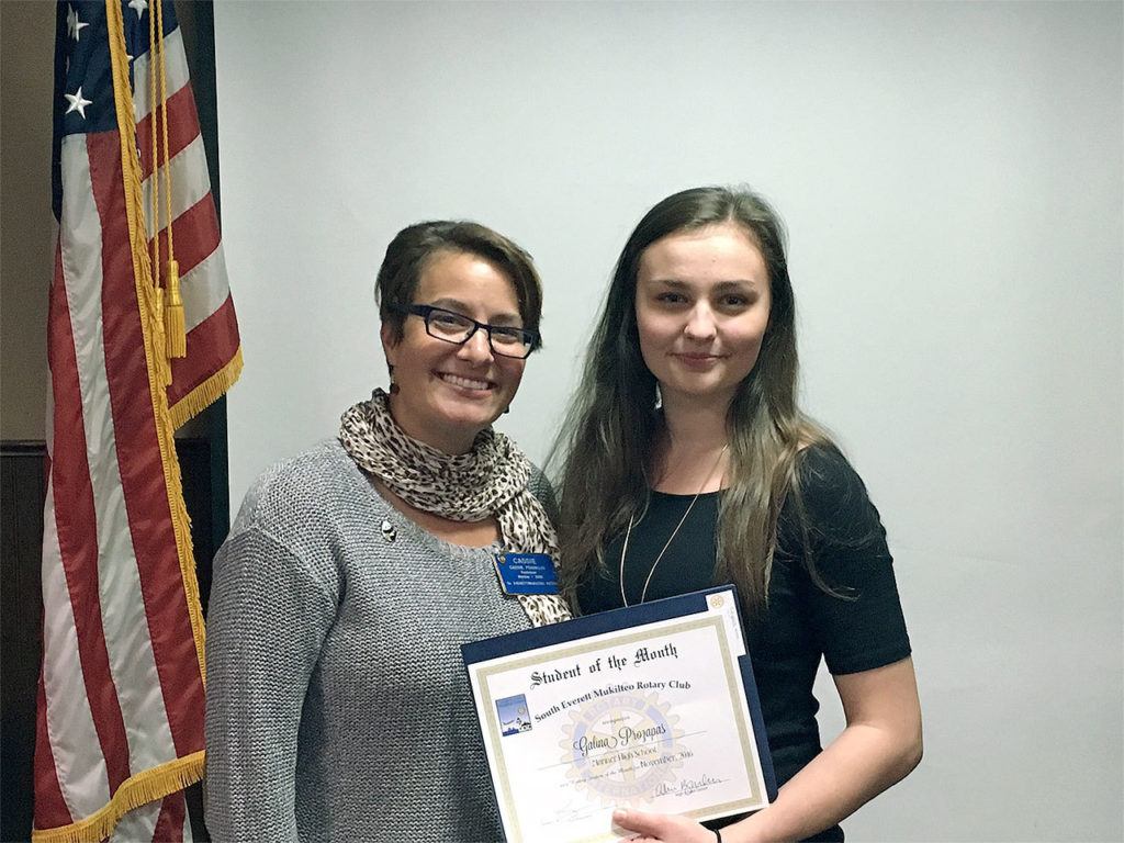 Cassie Franklin, South Everett-Mukilteo Rotary Club president, congratulates Mariner High School senior Galina Prozapas as one of the club’s Students of the Month for November. (Contributed photo)

