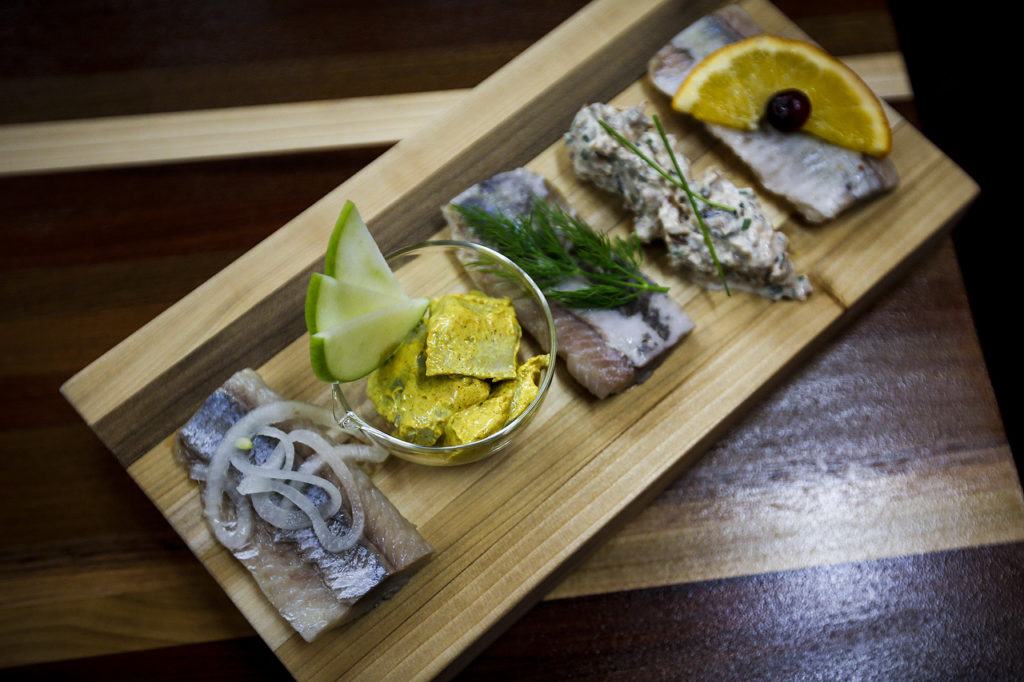 A Herrings Bord, consisting of five different pickled herring bites, is seen at Old Ballard Liquor Co. (Ian Terry / The Herald)
