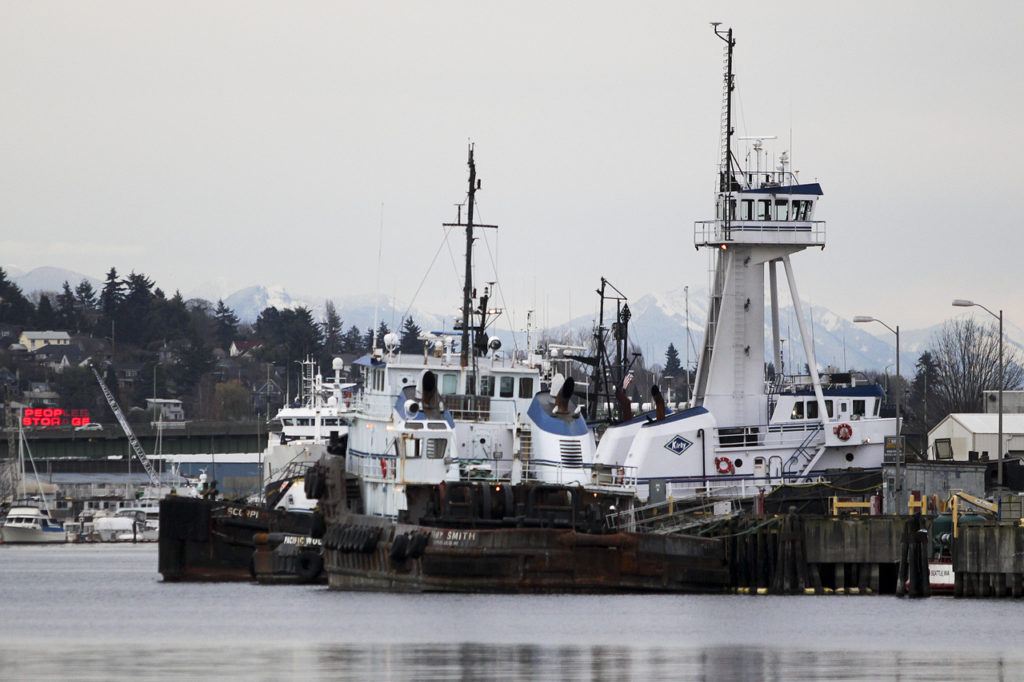 Boats moored on Ballard’s waterfront offers up a view of the old days, when the neighborhood’s Scandinavian fishing heritage was strong and boutique shops and restaurants were nowhere to be found. (Ian Terry / The Herald)
