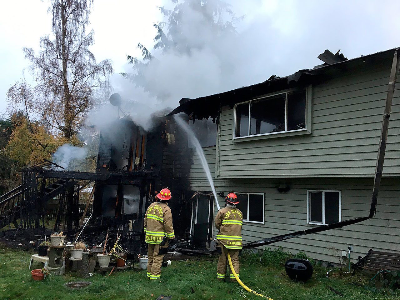 Firefighters battle a blaze at a home near Edmonds on Saturday morning. (Snohomish County Fire District 1)