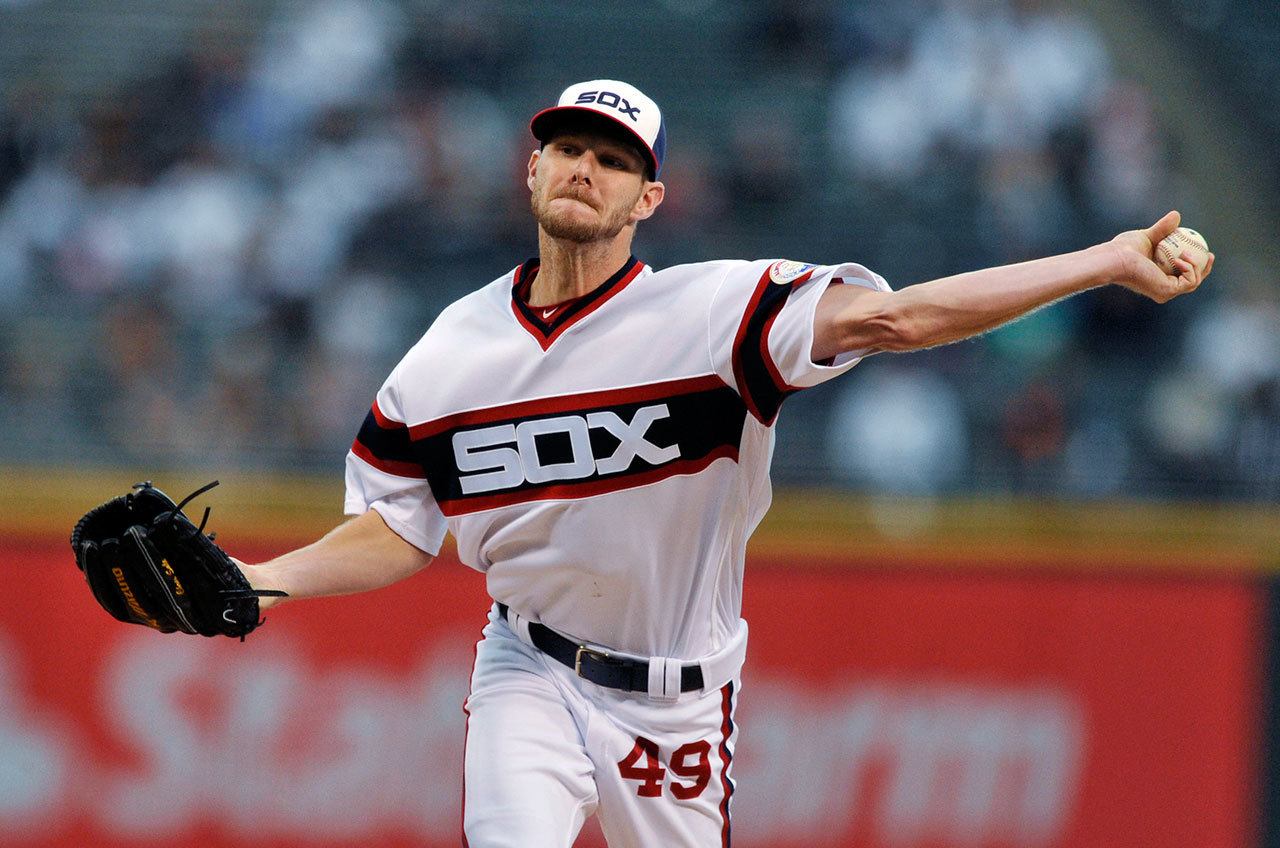 Chicago White Sox pitcher Chris Sale delivers a pitch during a baseball game against the Minnesota Twins in October. A source has told The Associated Press that Sale has been traded to the Boston Red Sox. (AP Photo/Paul Beaty, File)