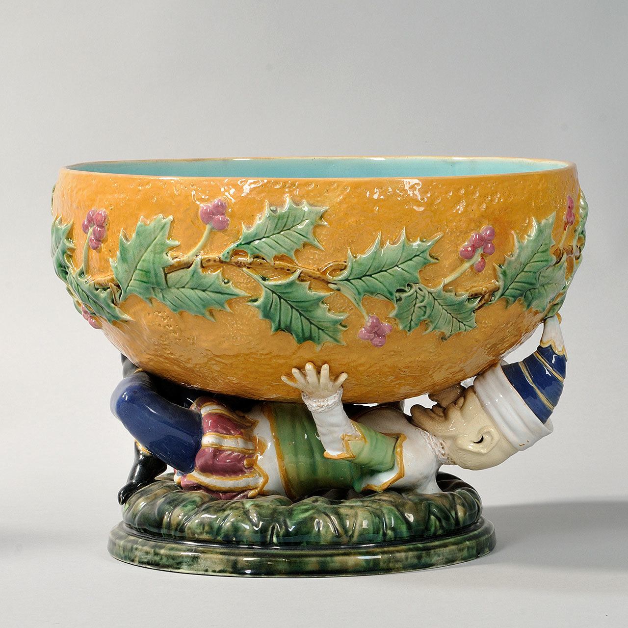 Christmas punch bowl that is decorated with holly and held by the famous puppet character Punch auctioned at Skinner’s in Boston for $3,075 (Cowles Syndicate Inc.)