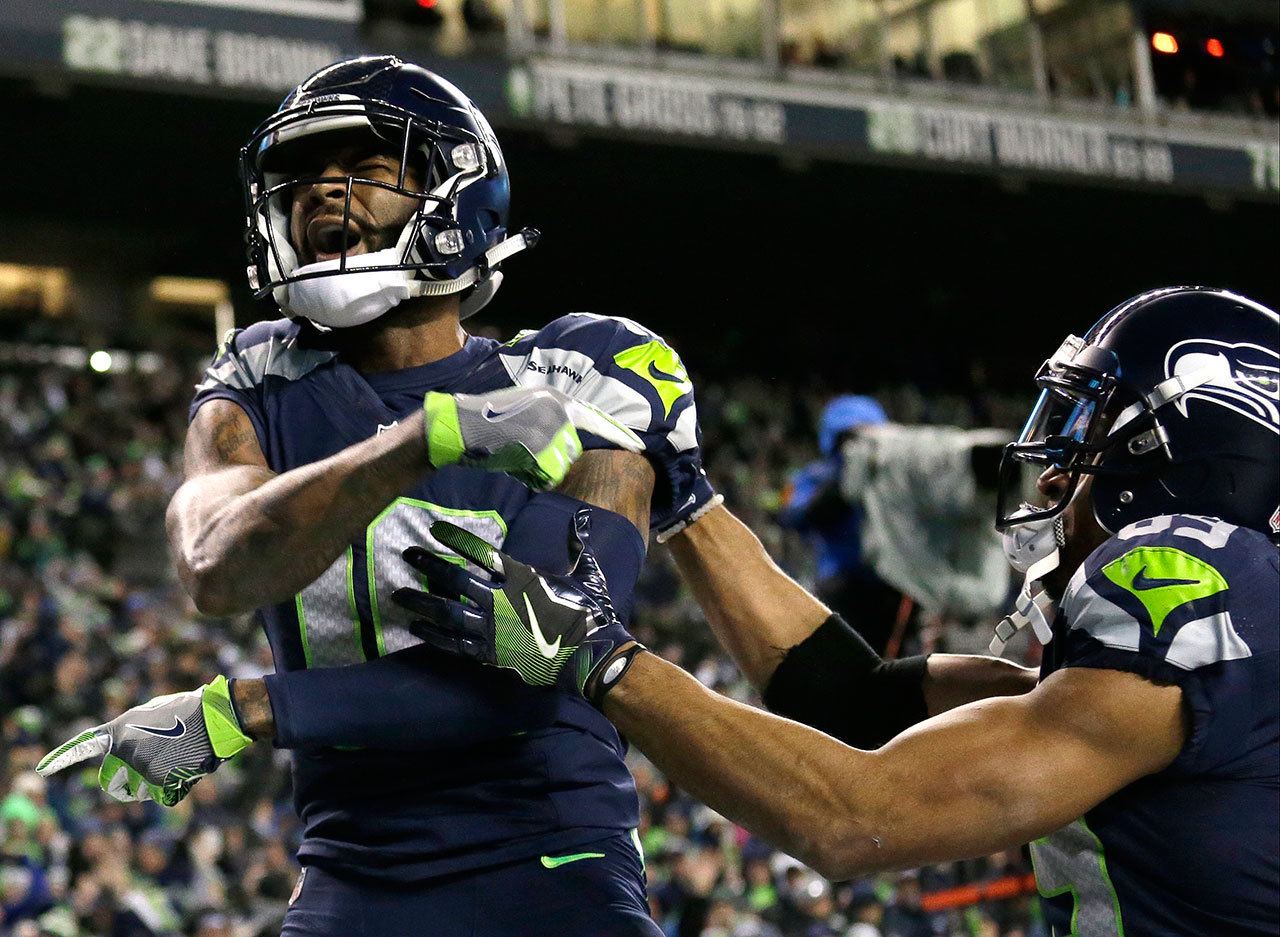 Seahawks wide receiver Paul Richardson celebrates after he caught a pass for a touchdown Saturday. (AP Photo/Elaine Thompson)