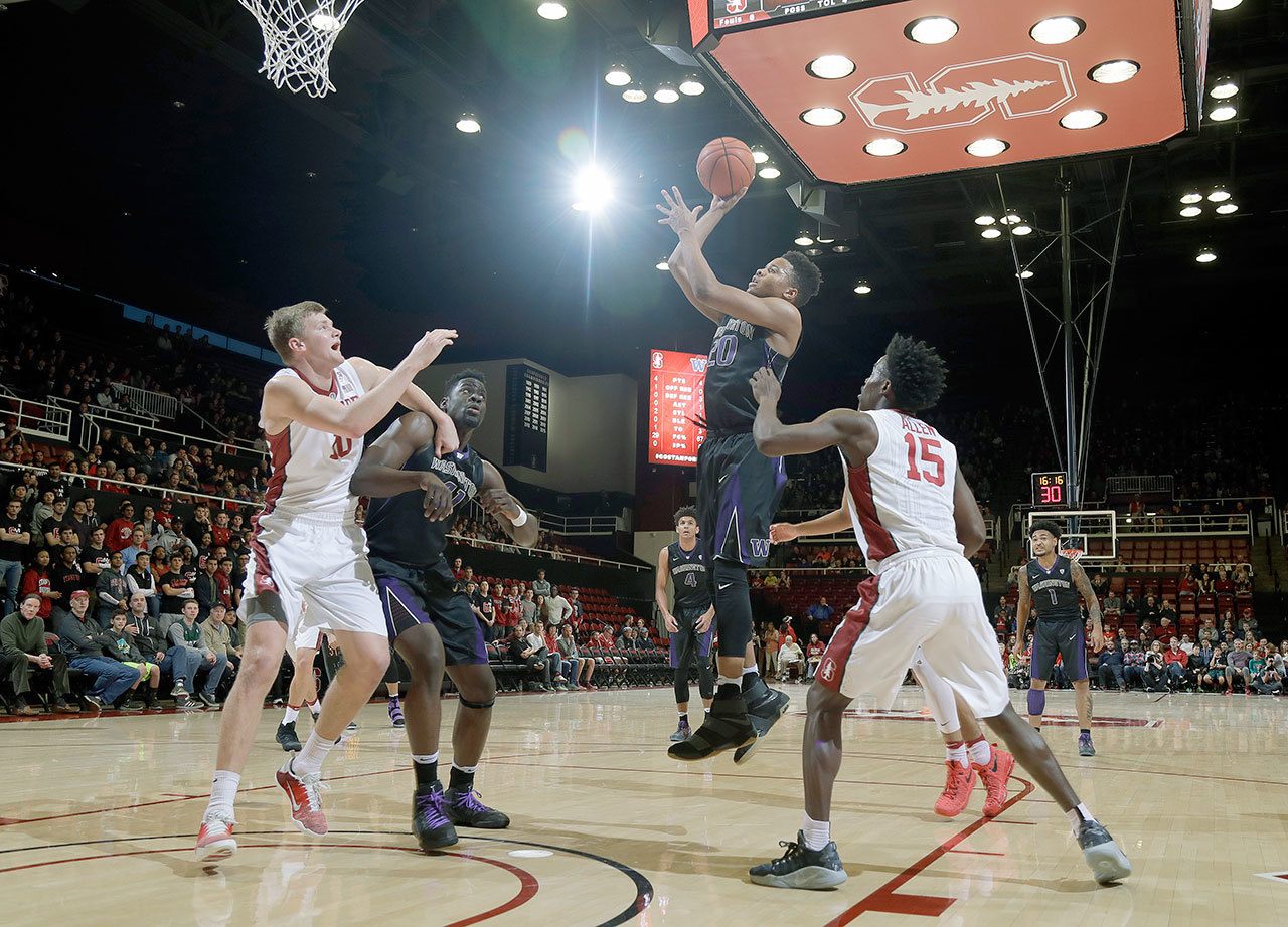Washington’s Markelle Fultz (20) shoots over Stanford’s Marcus Allen (15) during the first half the Huskies’ 74-69 loss to the Cardinal on Saturday in Stanford, Calif. (AP Photo/Marcio Jose Sanchez)
