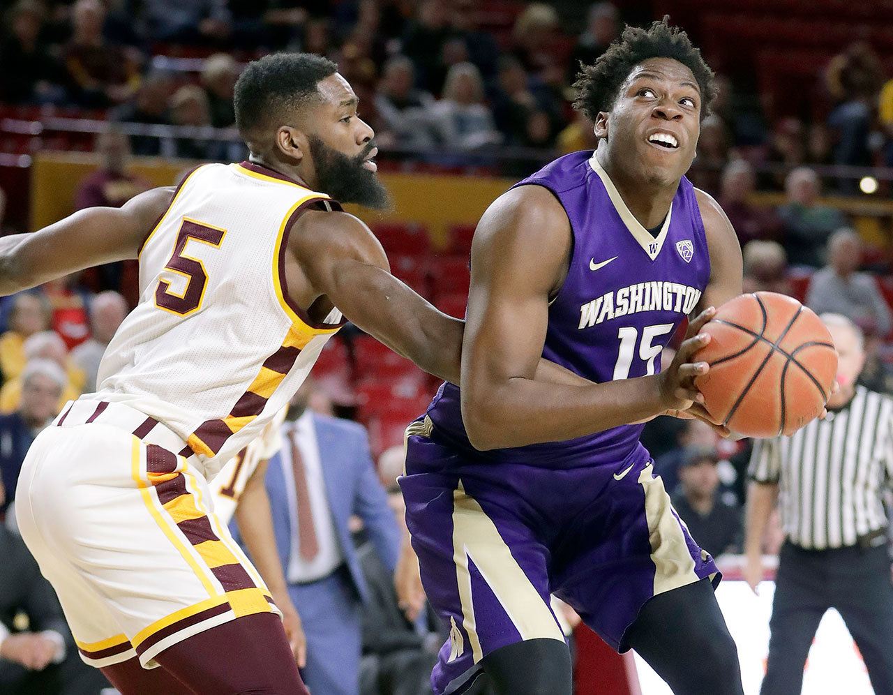 Washington’s Noah Dickerson (15) shown against Arizona State on Wednesday, is one of several UW players who must step up his offensive game to aid freshman star Markelle Fultz. (AP Photo/Matt York)