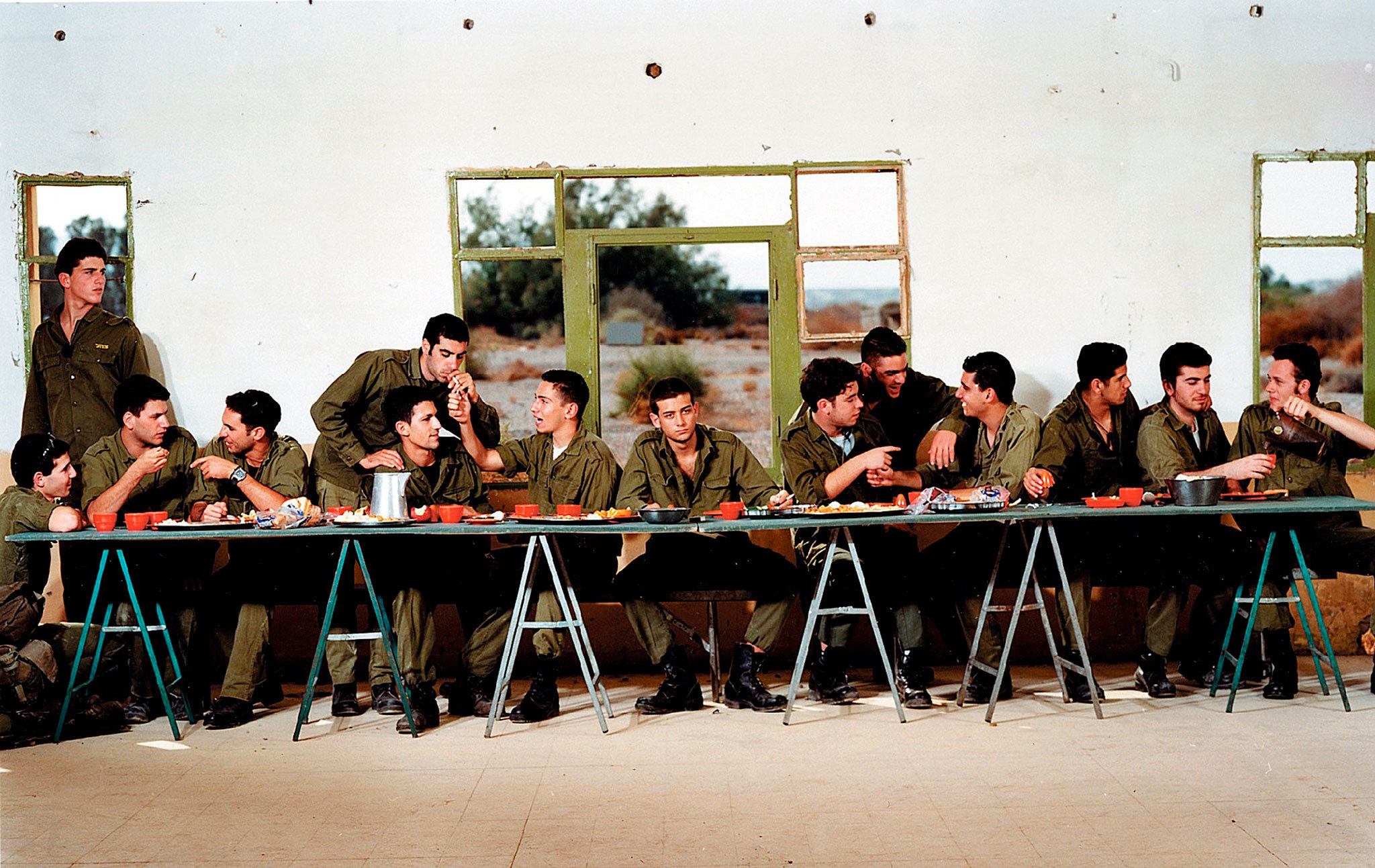 Israeli artist Adi Nes’ depiction of Leonardo da Vinci’s “Last Supper” substitutes Jesus’ apostles with Israeli soldiers. (Elie Posner — The Israel Museum)