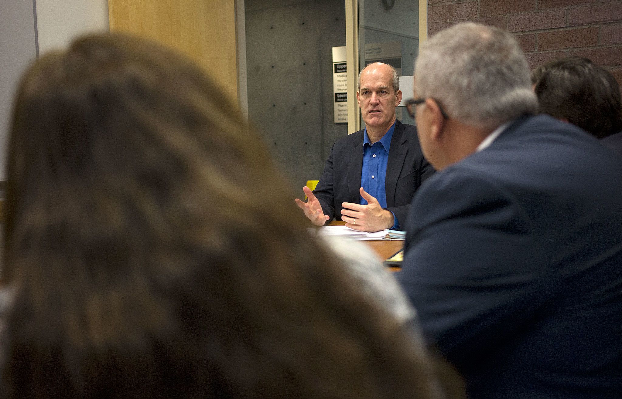 Congressman Rick Larsen, D-Wash., talks to and answers questions from healthcare officials about the future of the Affordable Care Act at the Community Health Center of Snohomish County Everett-South Clinic on Wednesday. (Andy Bronson / The Herald)