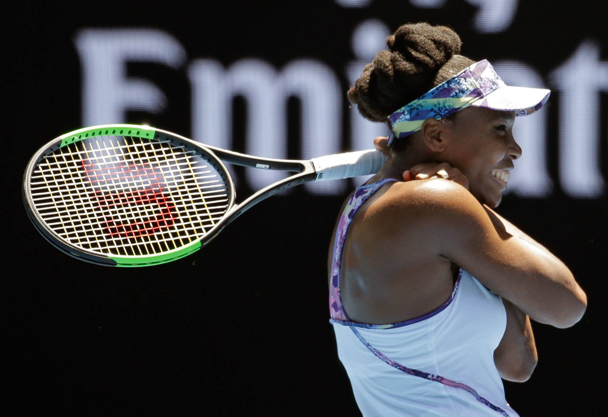 Venus Williams breaks into a smile after defeating Russia’s Anastasia Pavlyuchenkova during their quarterfinal Tuesday at the Australian Open tennis championships in Melbourne, Australia. (AP Photo/Aaron Favila)