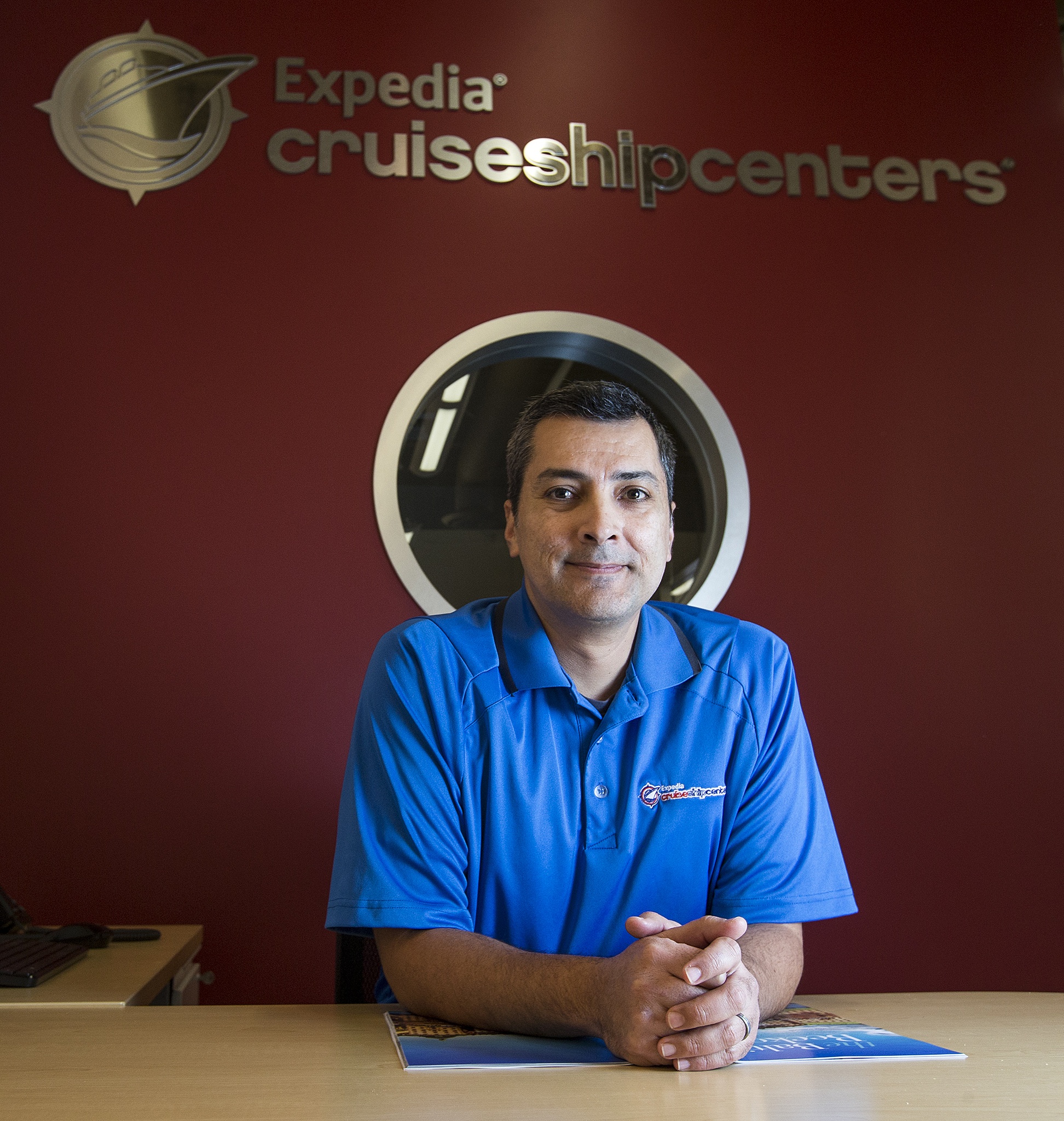 Ricardo Pruneda opened an Expedia CruiseShipCenters franchise in Mill Creek Town Center in August. Expedia currently operates 225 locations in the U.S. and Canada. (Ian Terry / The Herald)