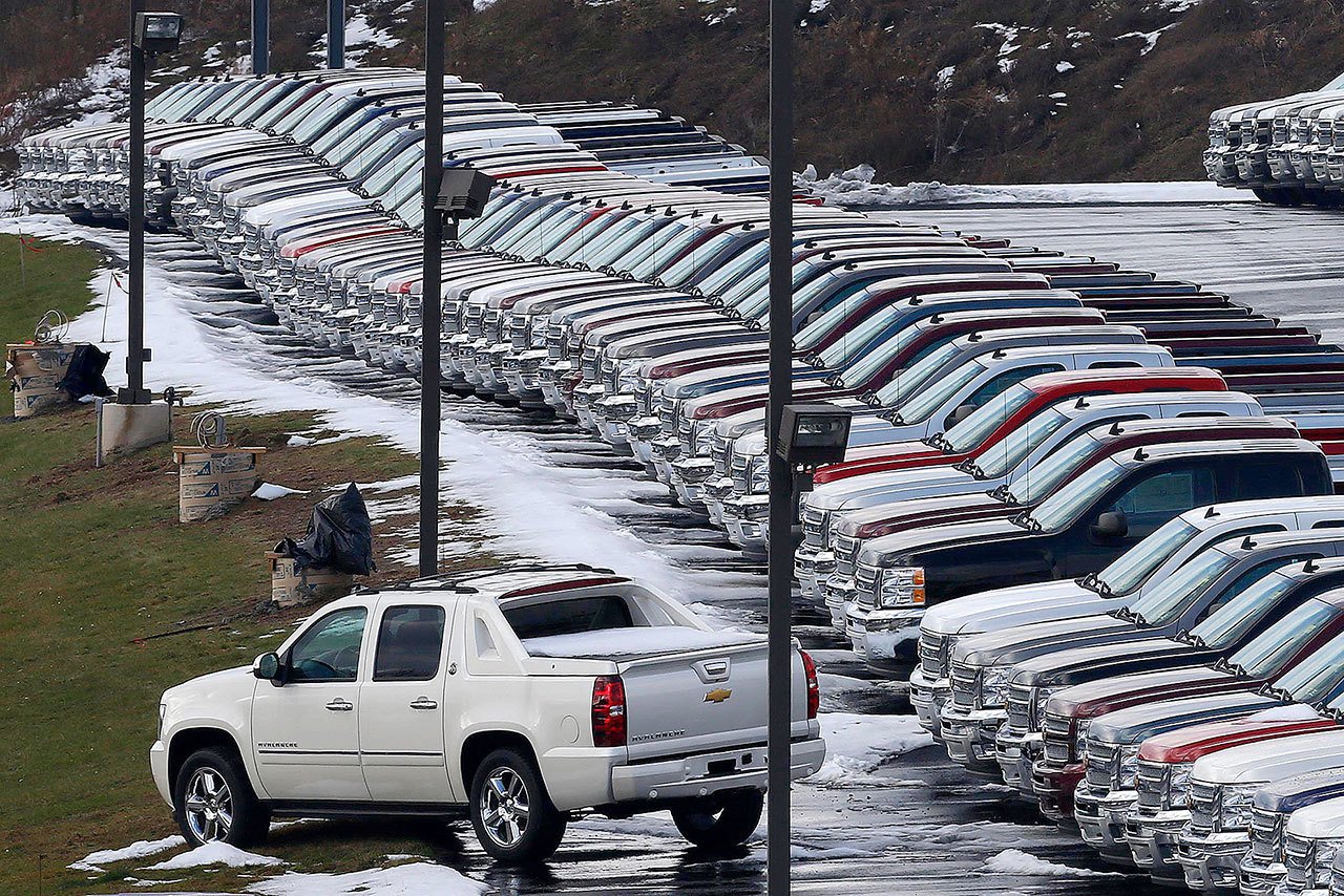 Chevy trucks line the lot of a dealer in Murrysville, Pennsylvania, in 2013. (AP Photo/Gene Puskar)