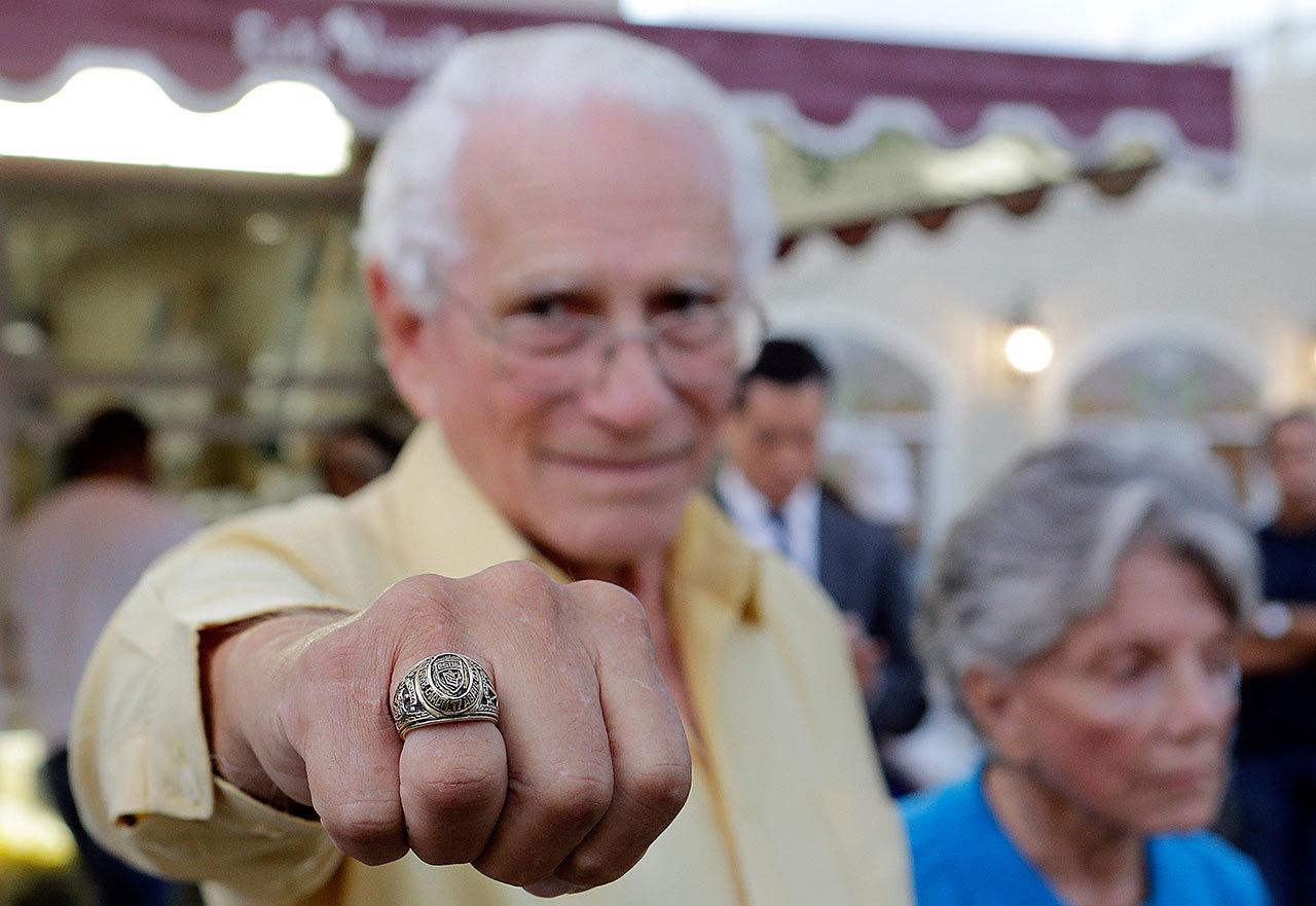 Cuban-American and veteran of the Bay of Pigs, Armando Gutierrez, shows his Brigade ring Thursday in the Little Havana area in Miami. (AP Photo/Alan Diaz)