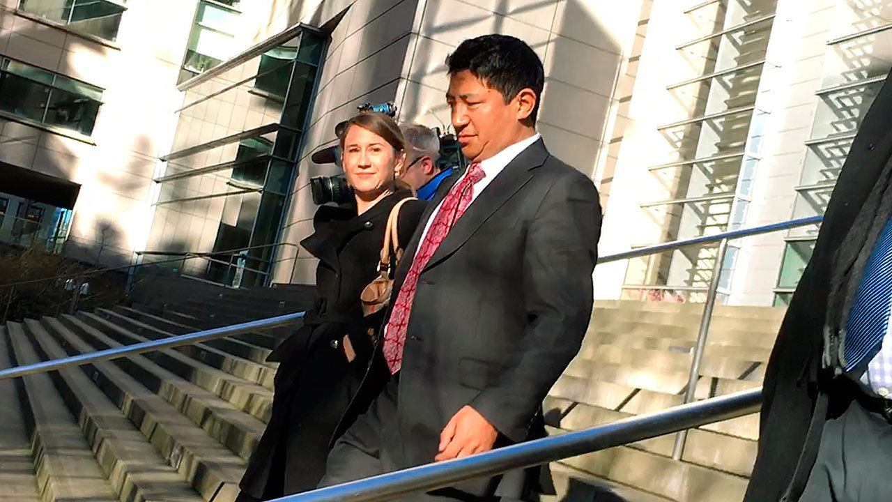 Lobsang Dargey leaves the U.S. District Court building in Seattle on Wednesday, Jan. 4, after pleading guilty to fraud charges. He was released pending sentencing. (Dan Catchpole / Everett Herald)