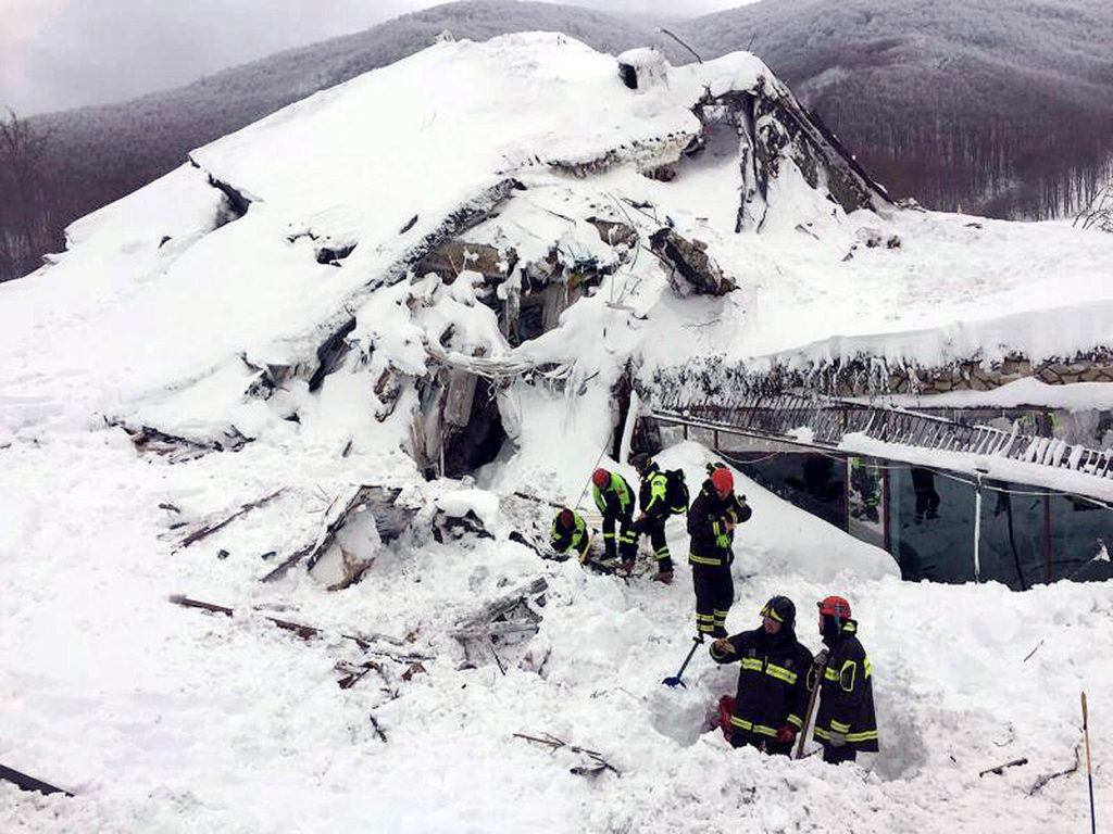 Italian firefighters search for survivors after an avalanche buried a hotel near Farindola, in central Italy, on Thursday. (Italian Firefighters/ANSA via Italian Firefighters)
