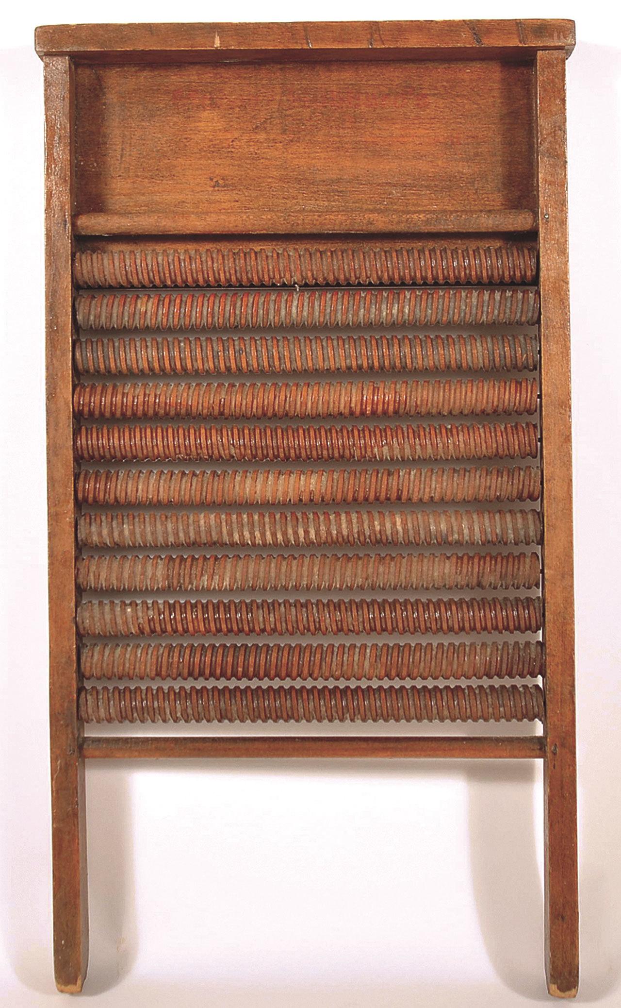 This all-wooden washboard sold at auction for $195. It is 22 inches high and still in working condition, although it is at least 80 years old. (Cowles Syndicate Inc.)                                This all-wooden washboard sold at auction for $195. It is 22 inches high and still in working condition, although it is at least 80 years old. (Cowles Syndicate Inc. photo)
