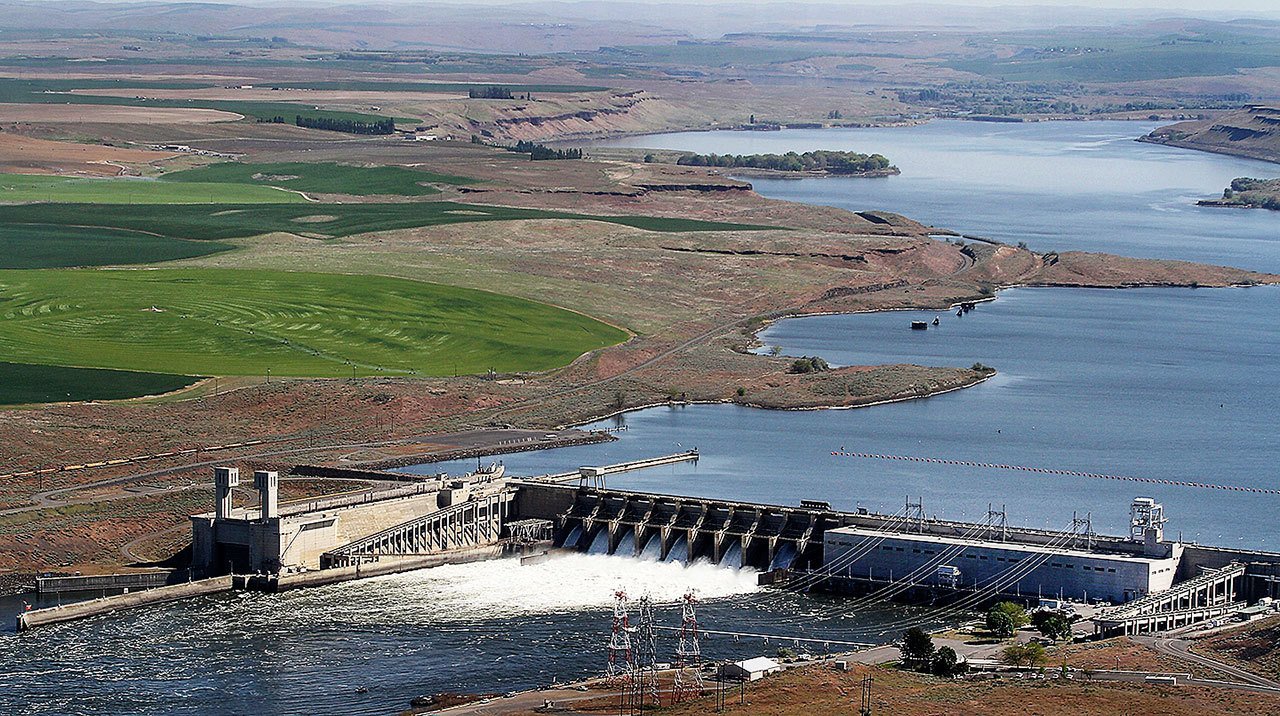 In this 2013 photo, the Ice Harbor Dam on the Snake River is seen near Pasco. Environmental groups are asking a federal court to halt 11 infrastructure projects on four lower Snake River dams in Washington state that could ultimately be removed following an environmental review now underway. (Bob Brawday/The Tri-City Herald via AP, File)