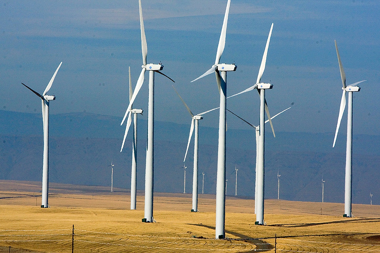 Wind turbines dot the landscape east of Wasco, Oregon, in 2008. California, Hawaii, Oregon, New York and many other Democratic-leaning states have ambitious goals to wean themselves off fossil fuels, but doing so requires an investment in renewable energy that could be in jeopardy now that Donald Trump has assumed the presidency. (Jamie Francis/The Oregonian via AP, File)