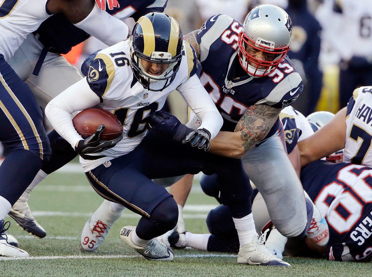 Patriots defensive end Chris Long (95) sacks Rams quarterback Jared Goff (16) during the second half of a game on Dec. 4, 2016, in Foxborough, Mass. (AP Photo/Elise Amendola)