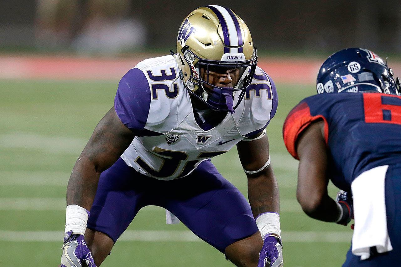 Washington safety Budda Baker (32) will skip his senior season and enter the NFL draft. (Rick Scuteri / Associated Press)