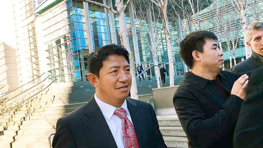 Lobsang Dargey leaves the U.S. District Court building in Seattle on Wednesday, Jan. 4. (Dan Catchpole / Everett Herald)
