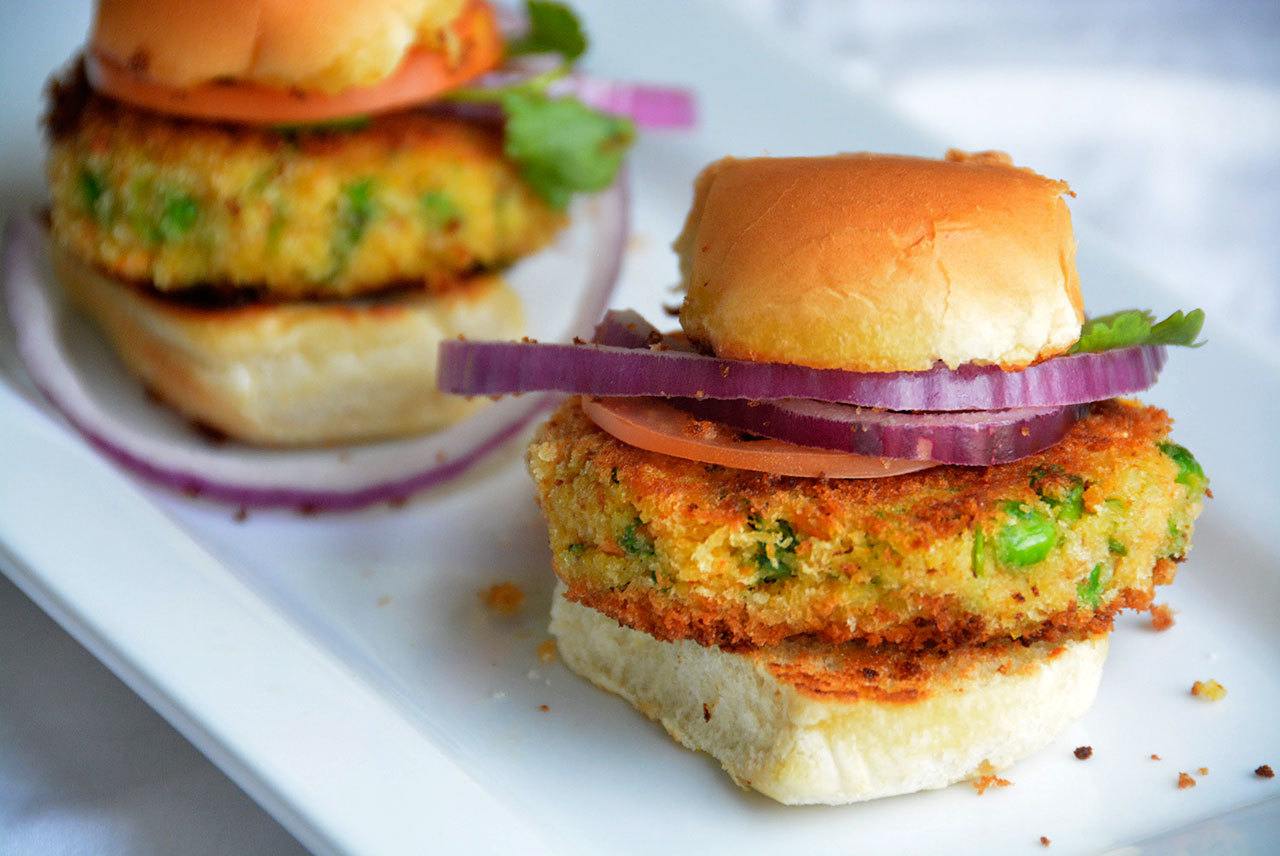Above: Millet burger patties are veggie cutlets of cooked millet, mashed potatoes, egg, carrot and cilantro. Top: Highly nutritious, millets are the least allergenic and most digestible grains available.