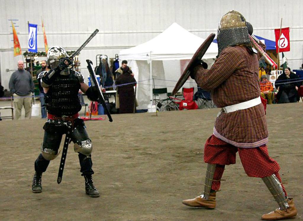 His Lordship Gideon Hrafensfuri, left, battles Sir Aethelred Cloudbreaker at a recent medieval fair. (Submitted photo)
