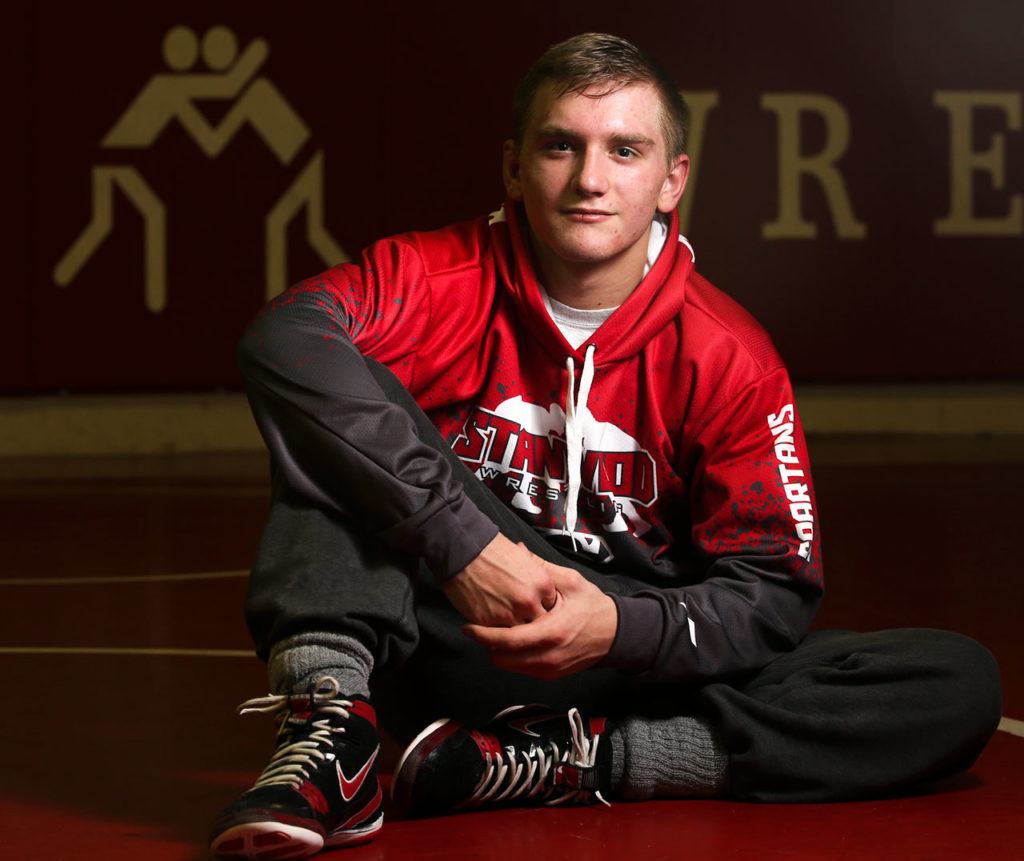 Stanwood junior Mason Phillips won a state championship last season as a sophomore after missing his entire freshman season with a knee injury. In the summer, he won a national age-group championship at the most prestigious amateur wrestling tournament in the country. (Kevin Clark / The Herald)
