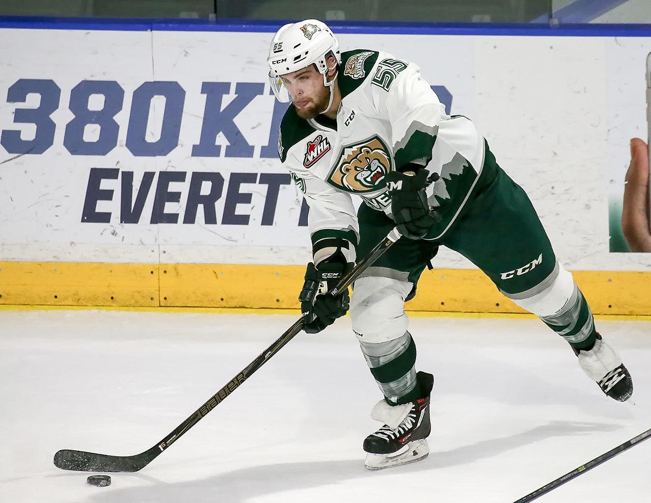 The Silvertips’ Aaron Irving looks to pass during a game against Spokane this past Sunday afternoon at Xfinity Arena. (Kevin Clark / The Herald)