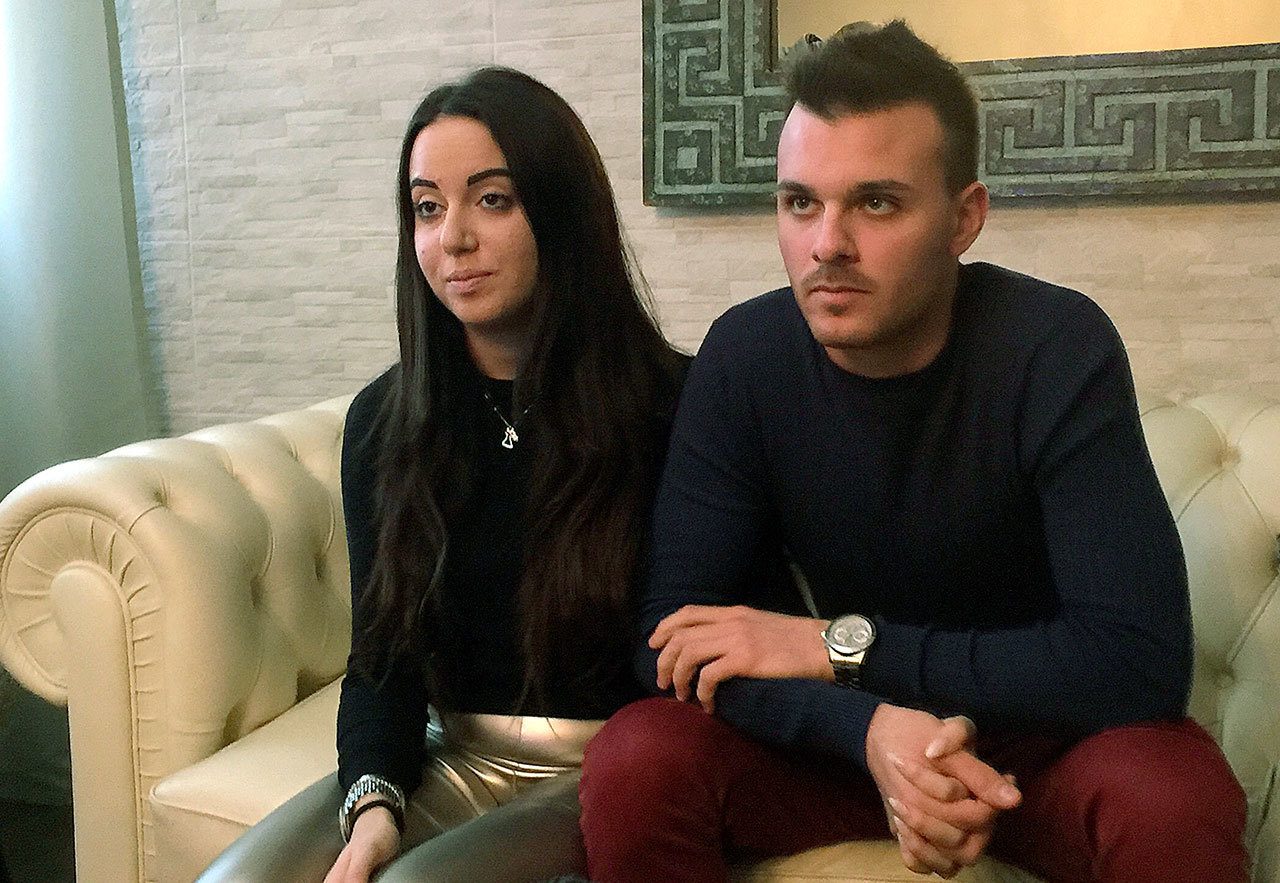 Vincenzo Forti (right) and Giorgia Galassi, two of the nine survivors of the avalanche that hit the Hotel Rigopiano last Wednesday, talk to the Associated Press in Giulianova, Italy, on Wednesday, Jan. 25. (AP Photo/Eldar Emric)